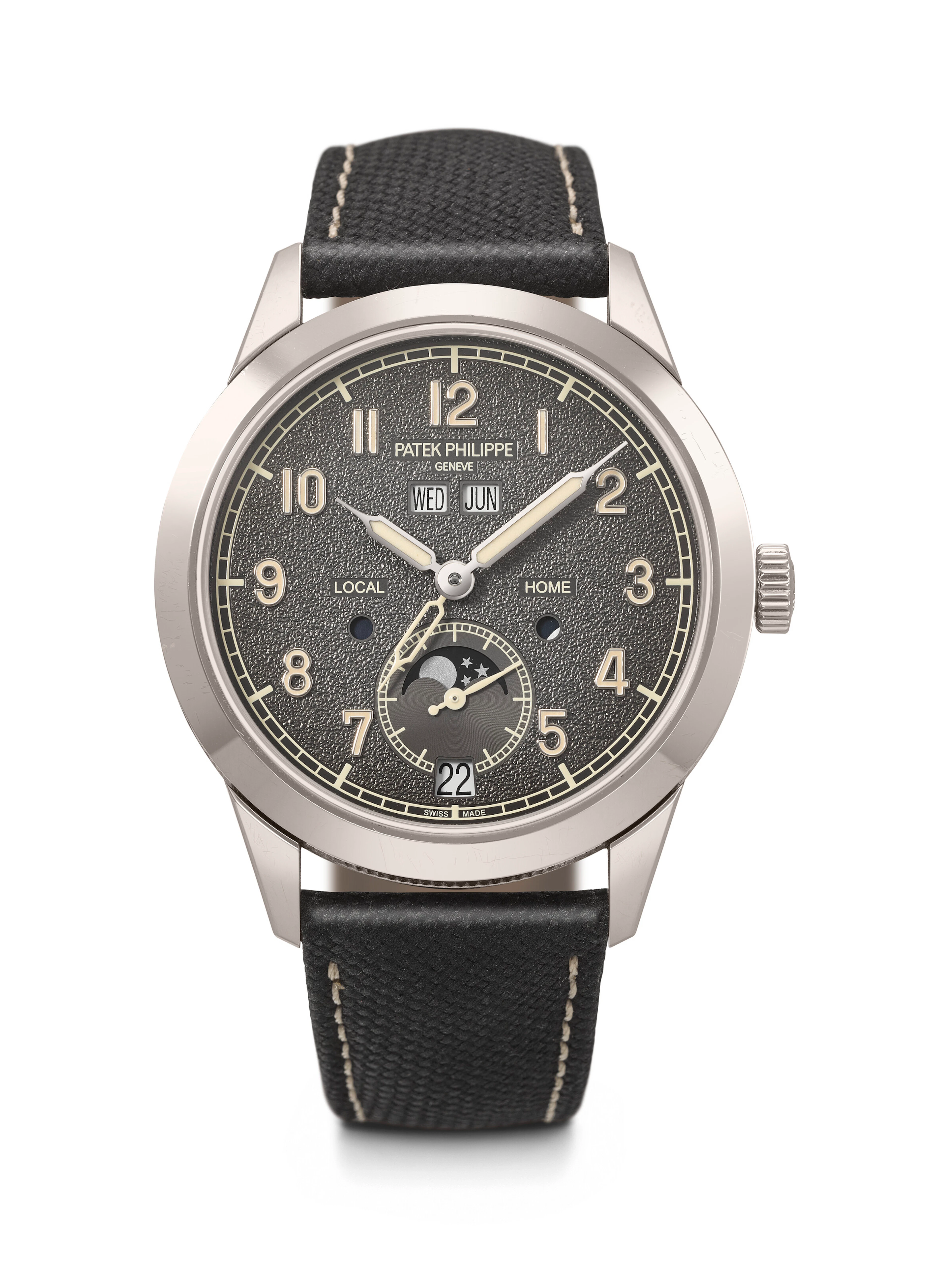 Patek Philippe. An Attractive 18K White Gold Automatic Annual Calendar