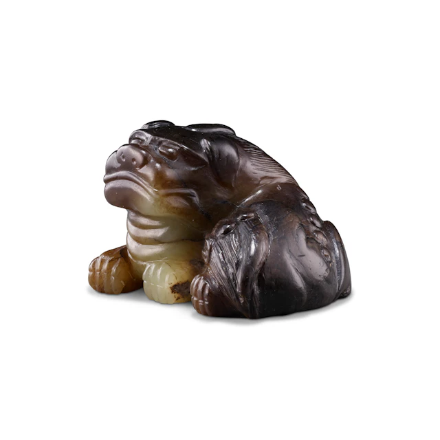 A Carved Celadon Jade 'Mythical Beast'