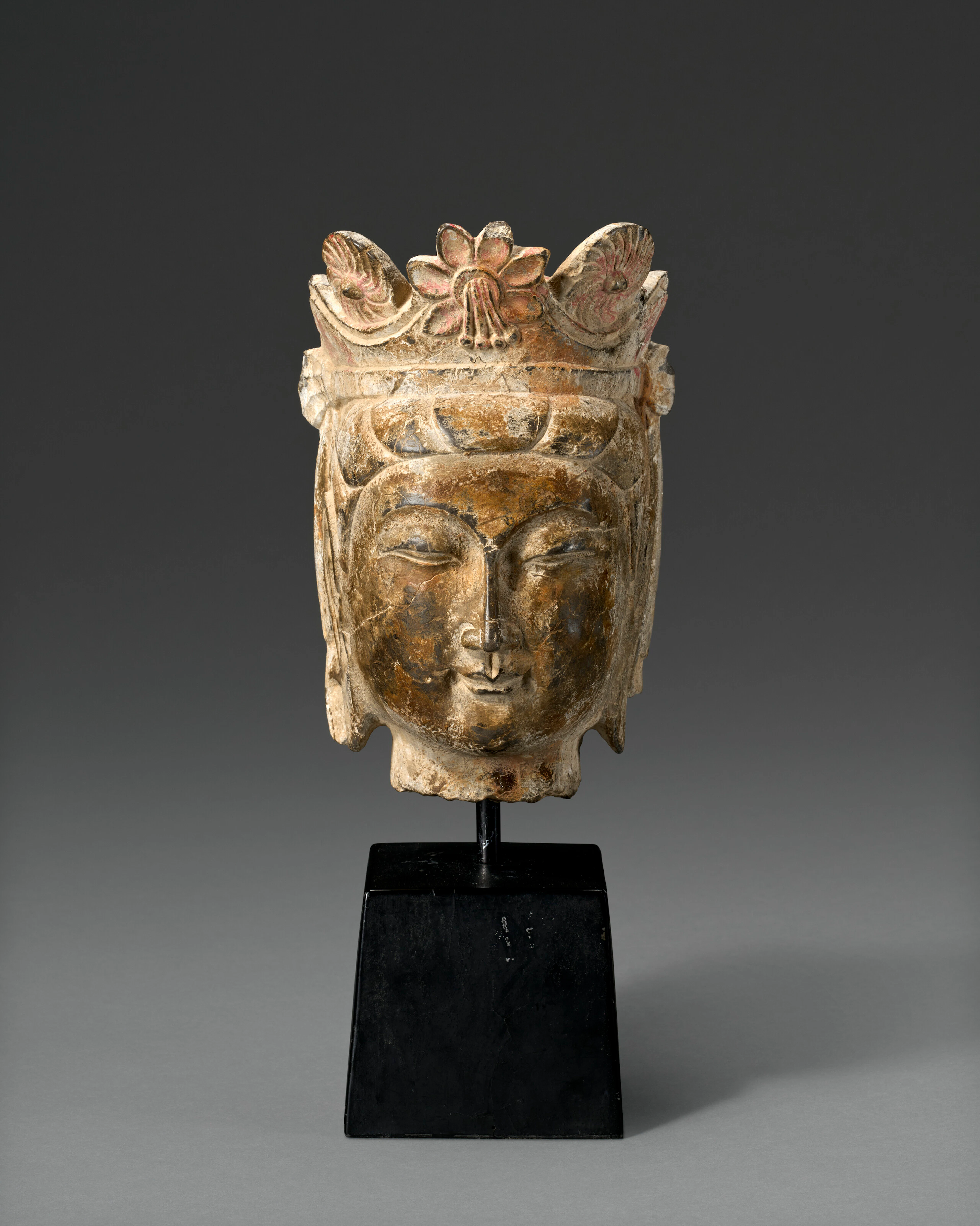 A Carved Stone Head of a Bodhisattva