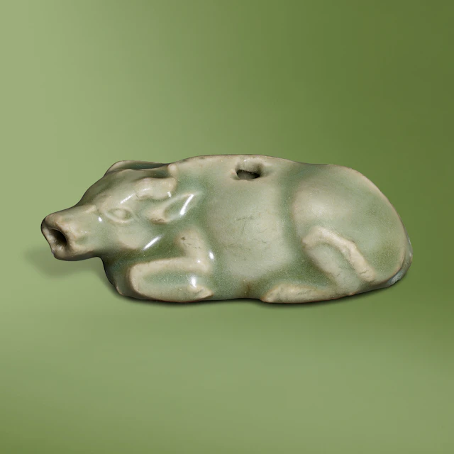 A Longquan Celadon 'Buffalo' Water Dropper