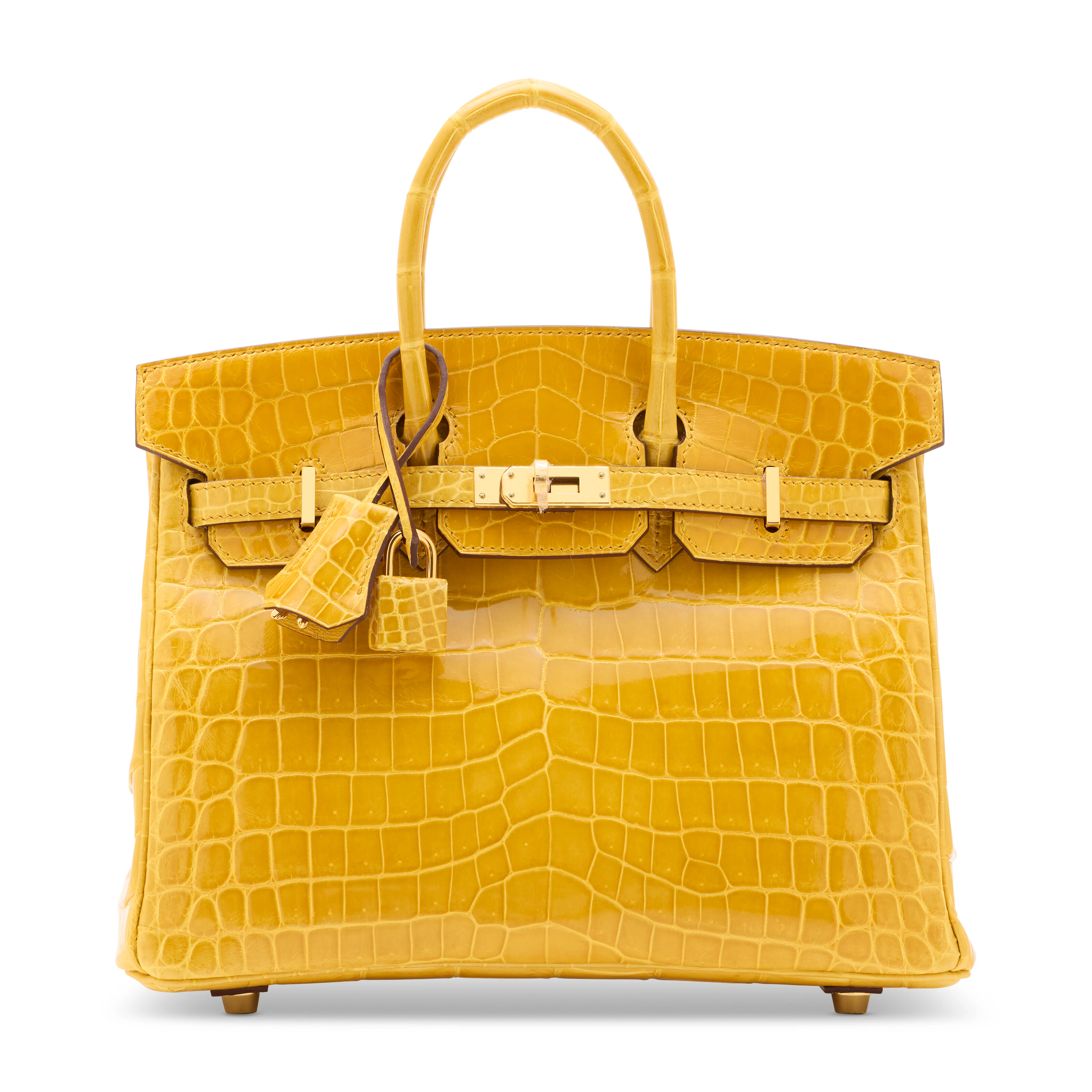 A SHINY JAUNE AMBRE NILOTICUS CROCODILE BIRKIN 25 WITH GOLD HARDWARE