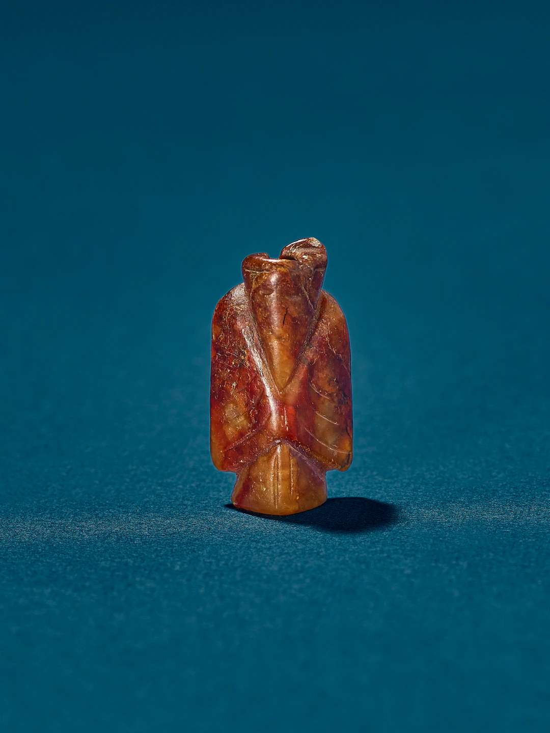 A Jade Figural Pendant