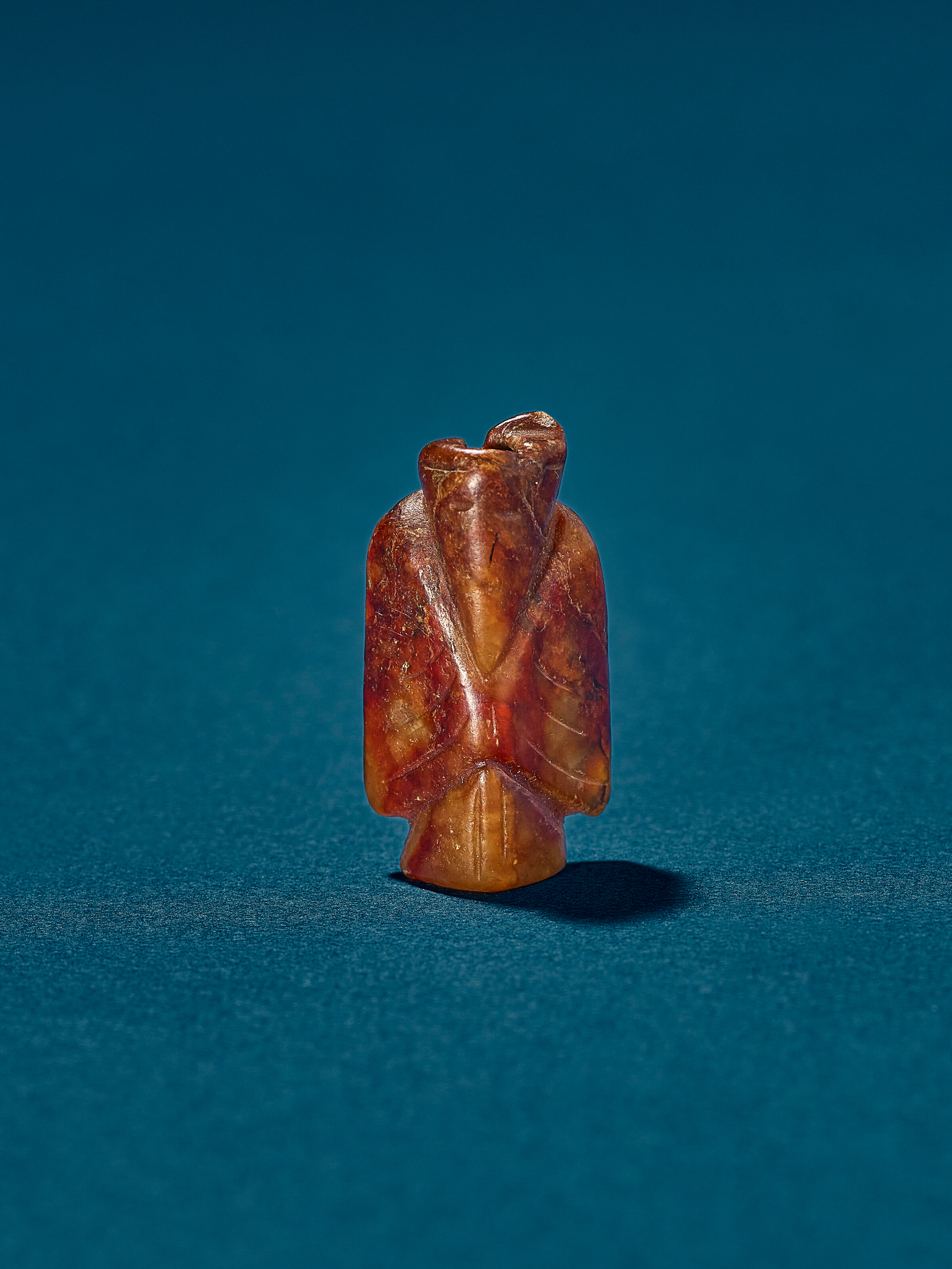 A Jade Figural Pendant