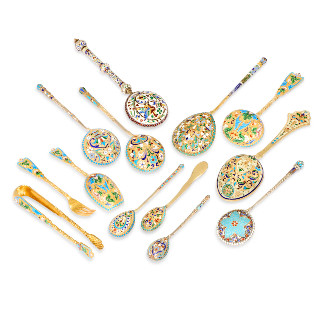 A Group of Nine Russian Cloisonné Enamel Silver-Gilt Spoons and a