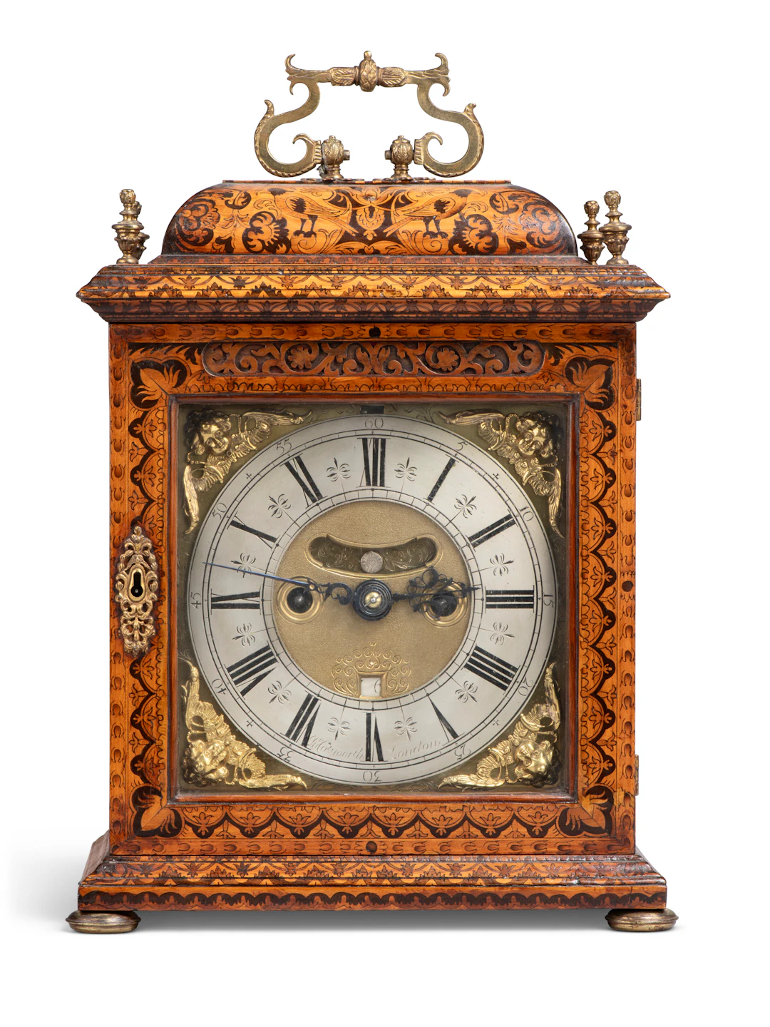 A William and Mary Marquetry and Fruitwood Striking Table Clock with