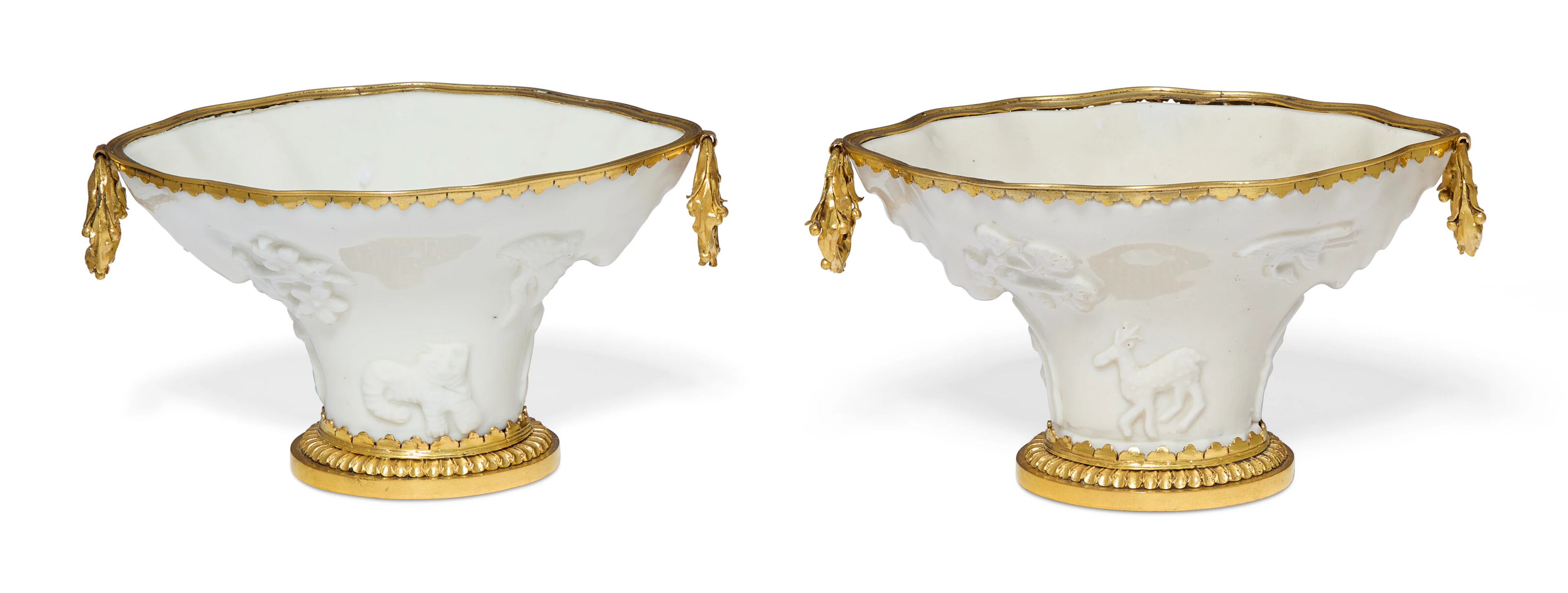 A Pair of French Ormolu-Mounted Chinese Dehua Porcelain Libation Cups