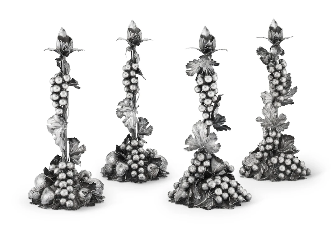 A Set of Four Italian Silver Candlesticks