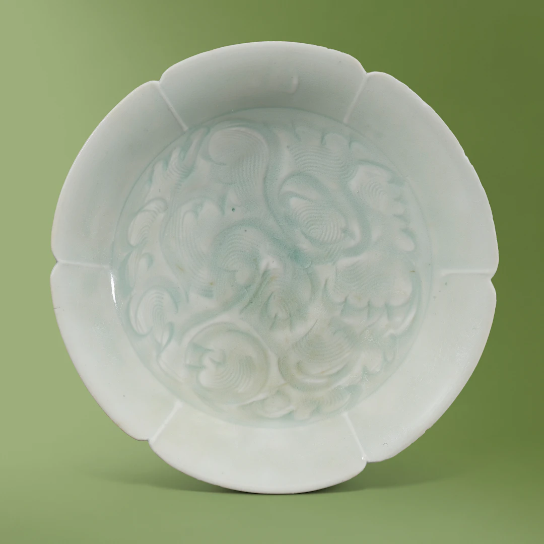 A Qingbai Carved Floriform Dish