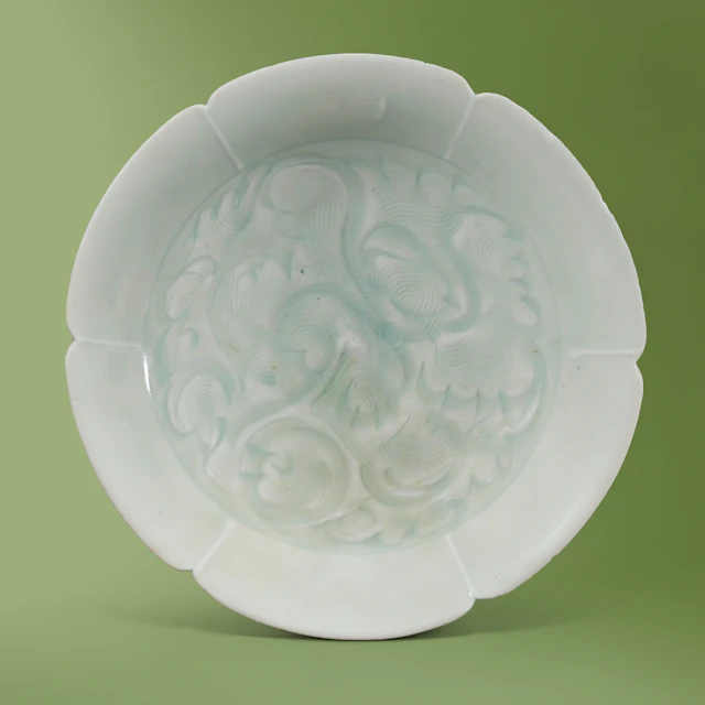 A Qingbai Carved Floriform Dish