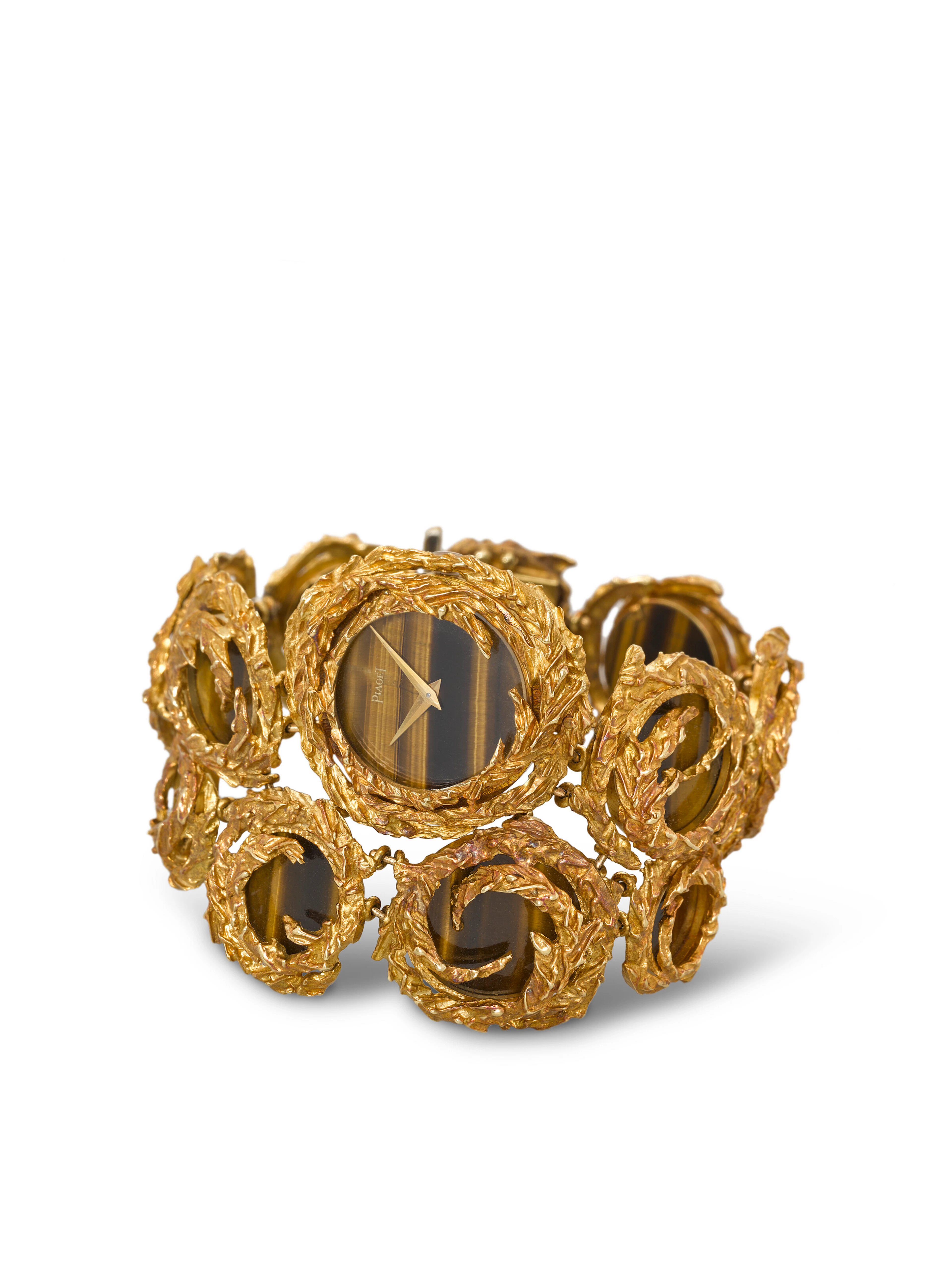 PIAGET. AN EXTREMELY RARE AND MAGNIFICENT 18K GOLD AND TIGER-EYE BRACELET