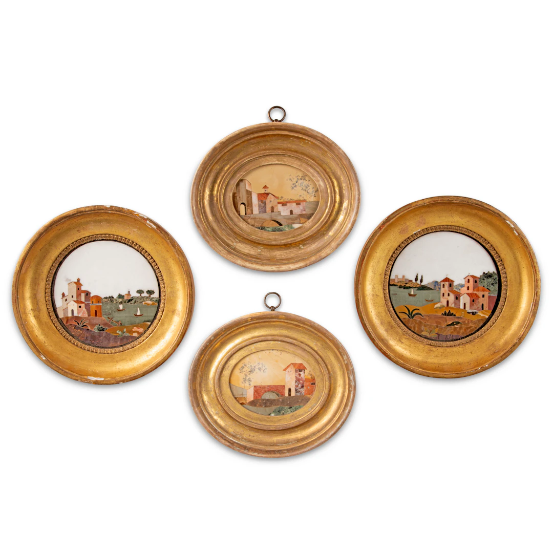 A Set of Four Italian Pietra Dura Circular and Oval Plaques