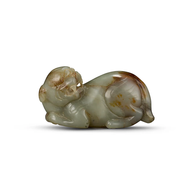 A Celadon Jade Carving of Mythical Beast