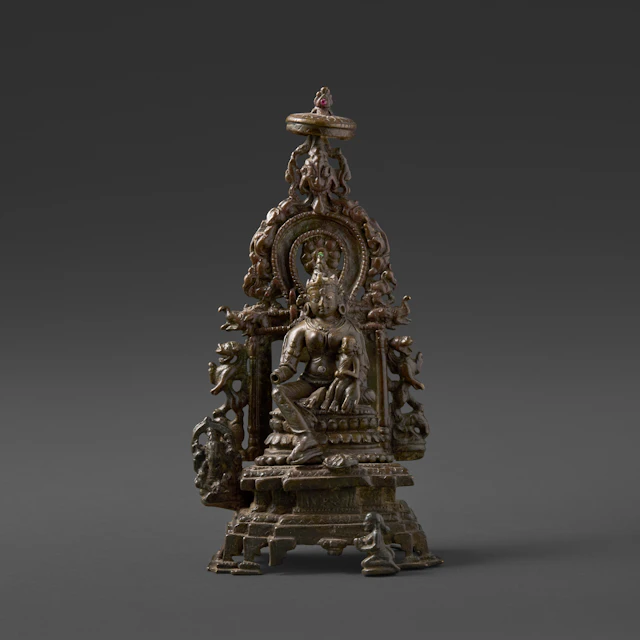 A Silver Inlaid Copper Alloy Enthroned Purneshvari