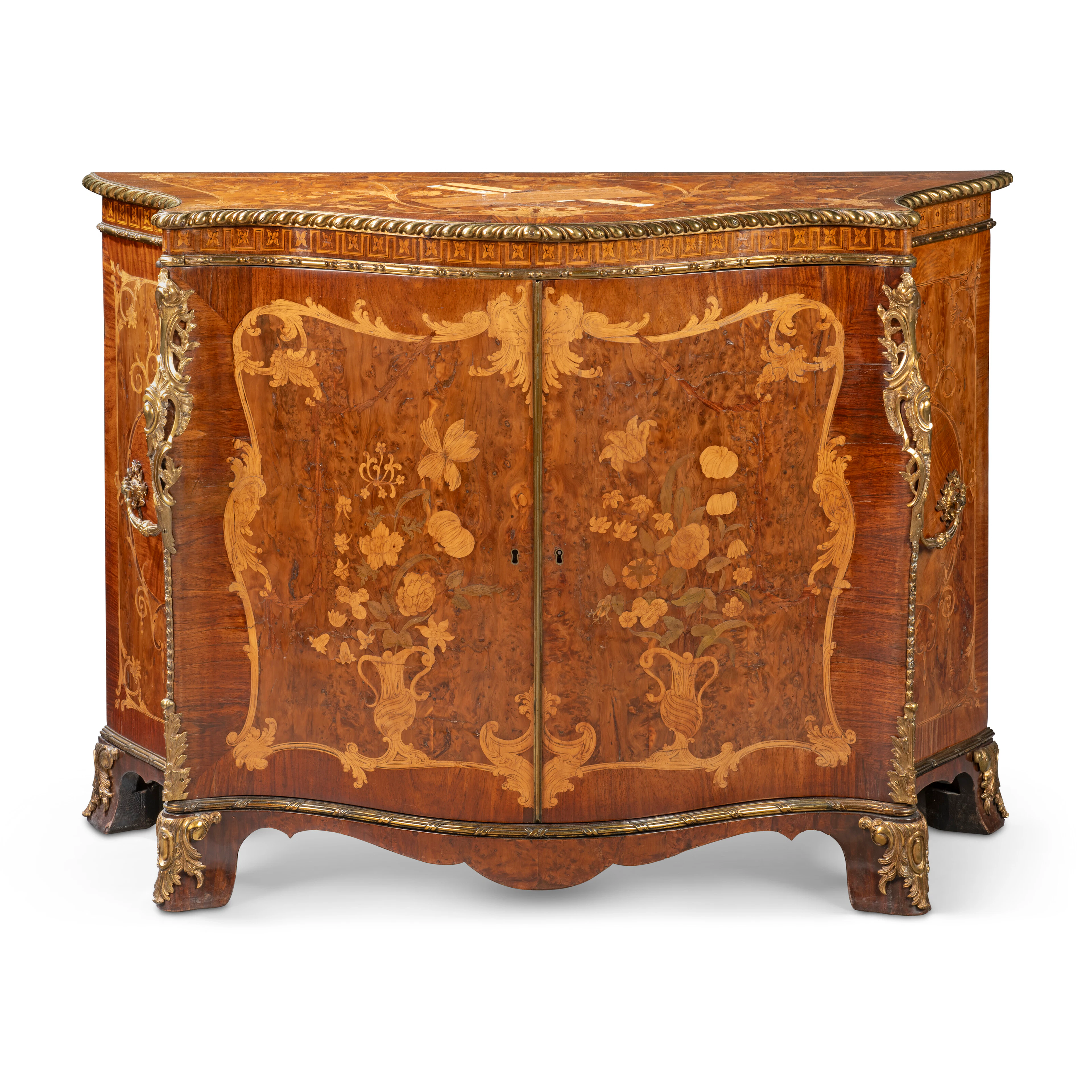 A George Iii Gilt-Lacquered-Brass-Mounted Serpentine Yew Wood, Padouk