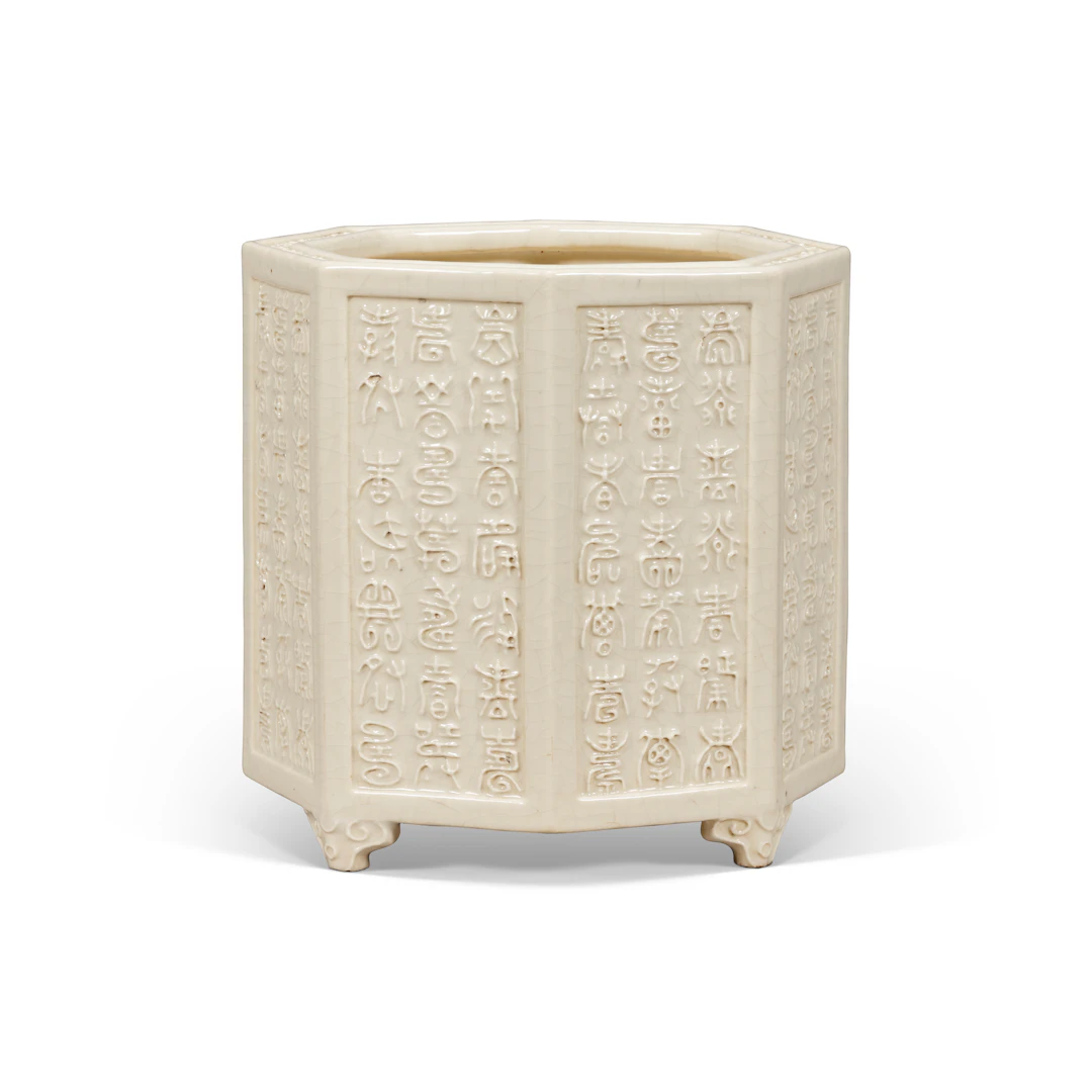 A Moulded White-Glazed Soft-Paste ' Shou ' Octagonal Brush Pot