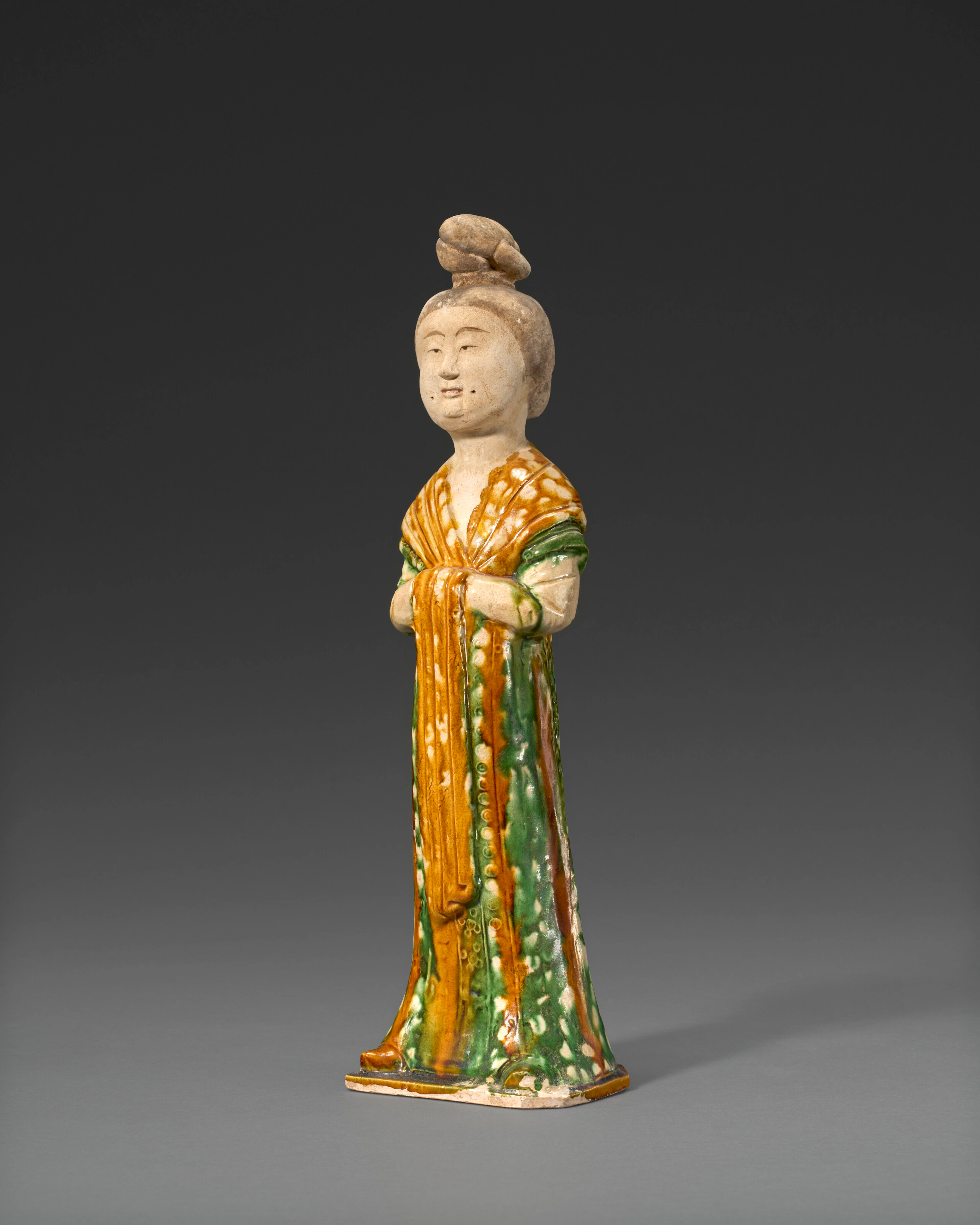 A Painted and Sancai -Glazed Pottery Figure of a Court Lady