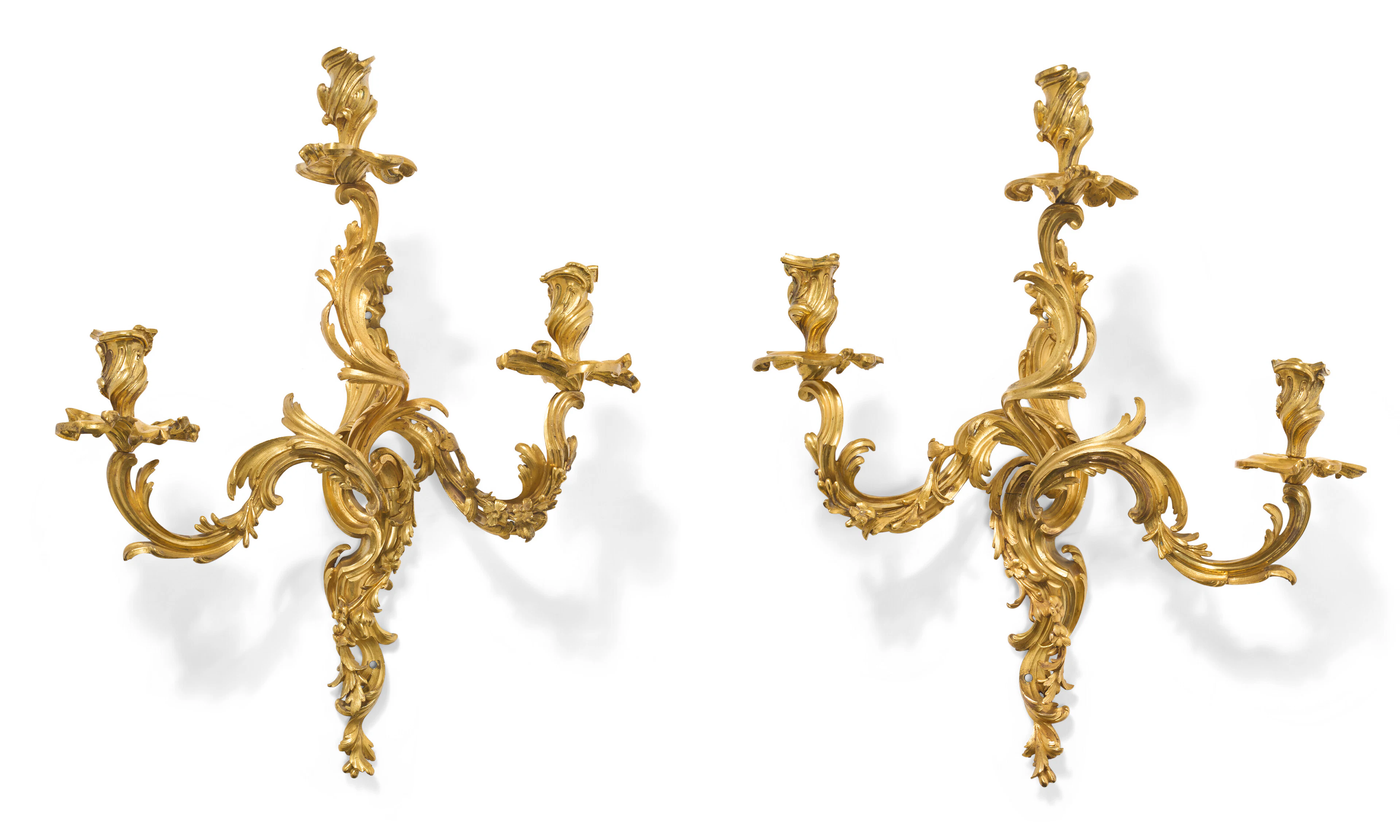 A PAIR OF LOUIS XV ORMOLU THREE-BRANCH WALL-LIGHTS