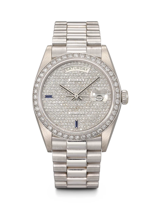 Rolex. A Rare and Dazzling 18K White Gold, Diamond and Sapphire-Set