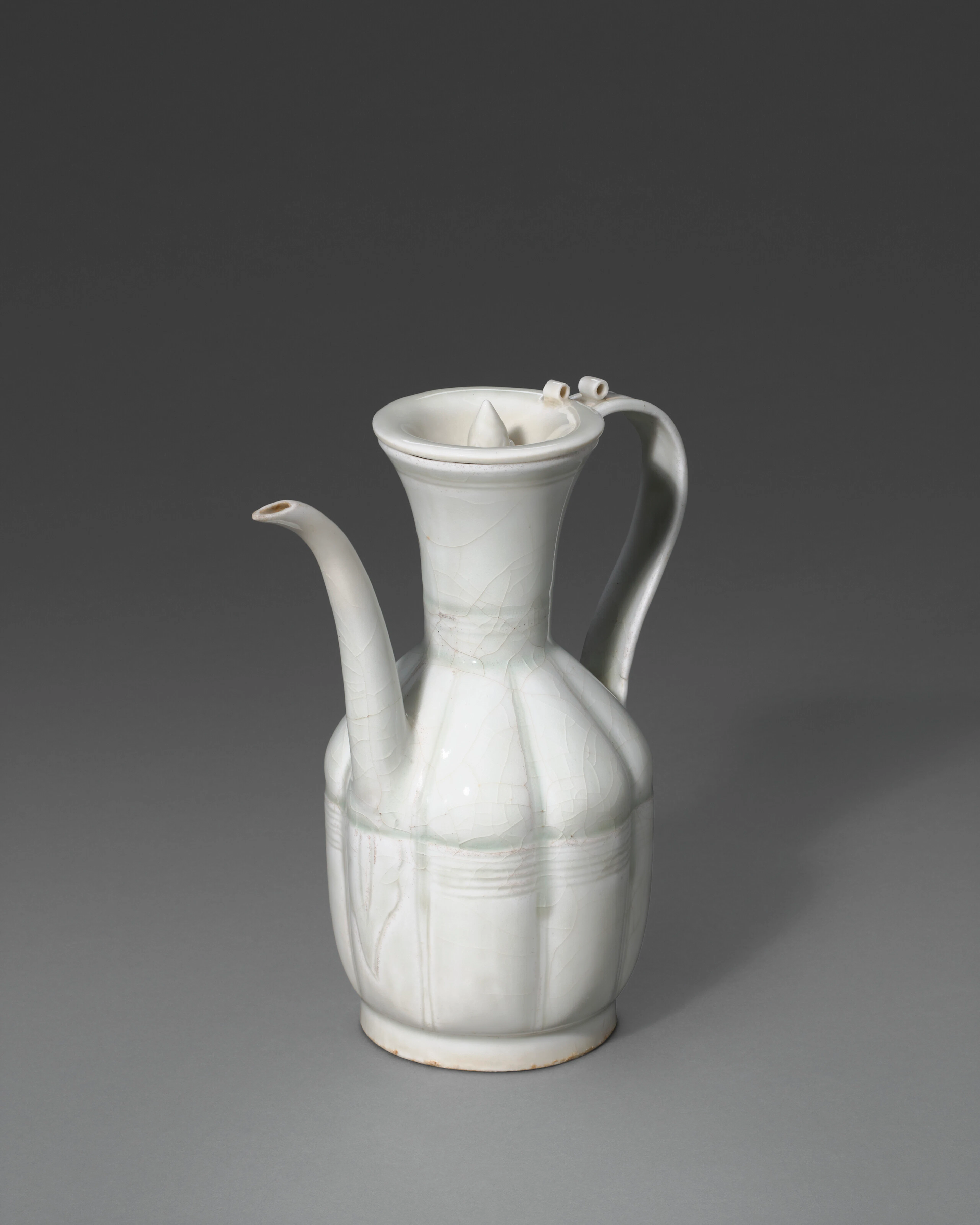 A Qingbai Ewer and Cover