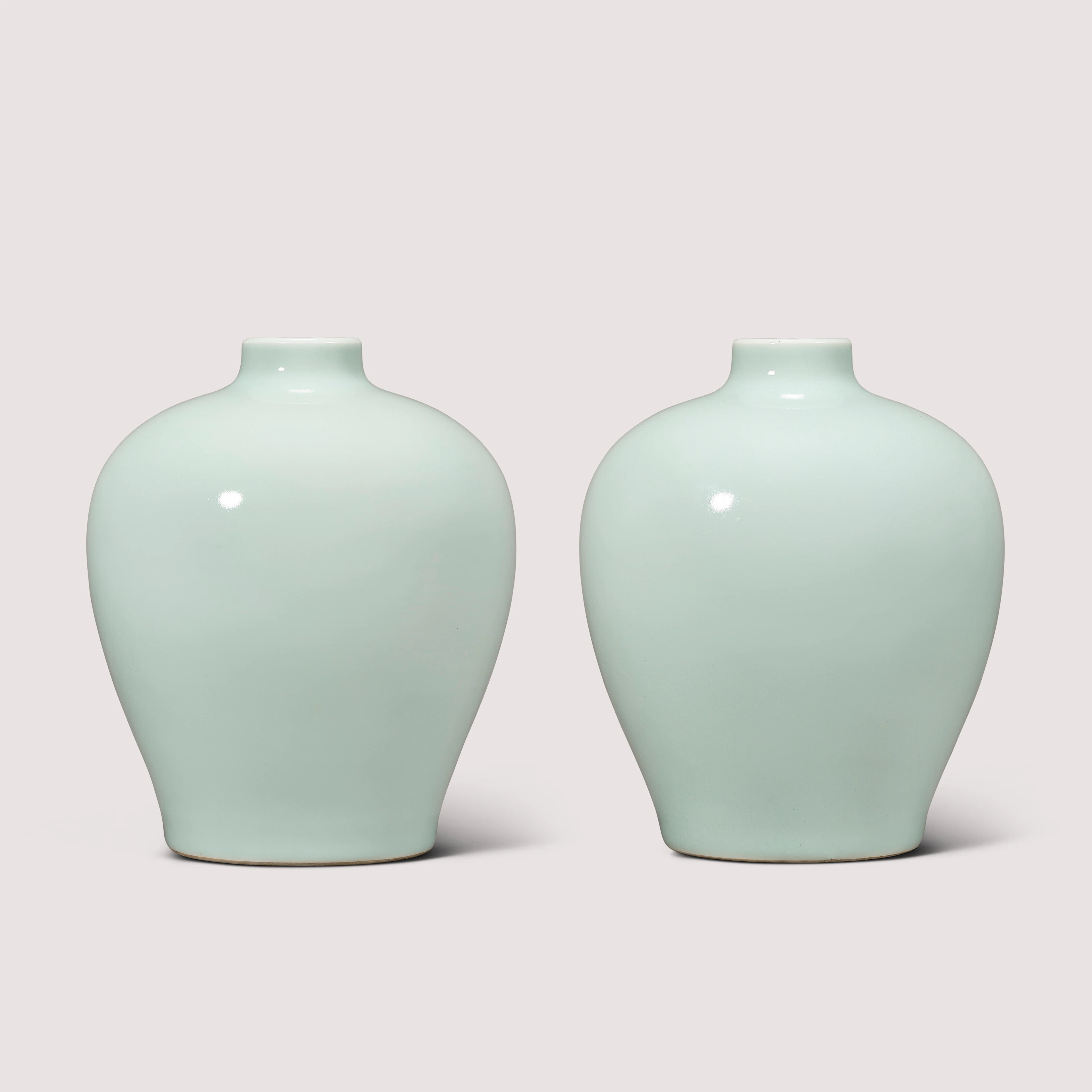 A Fine and Rare Pair of Celadon-Glazed Jars