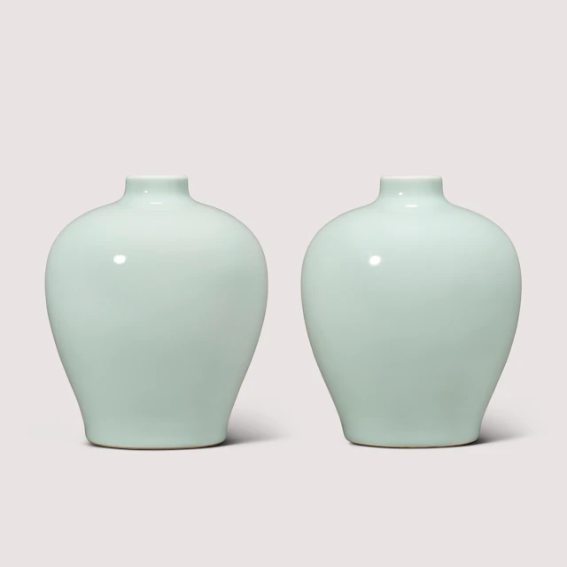 A Fine and Rare Pair of Celadon-Glazed Jars