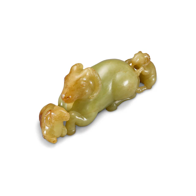 A Yellow Jade 'Three Rams' Group