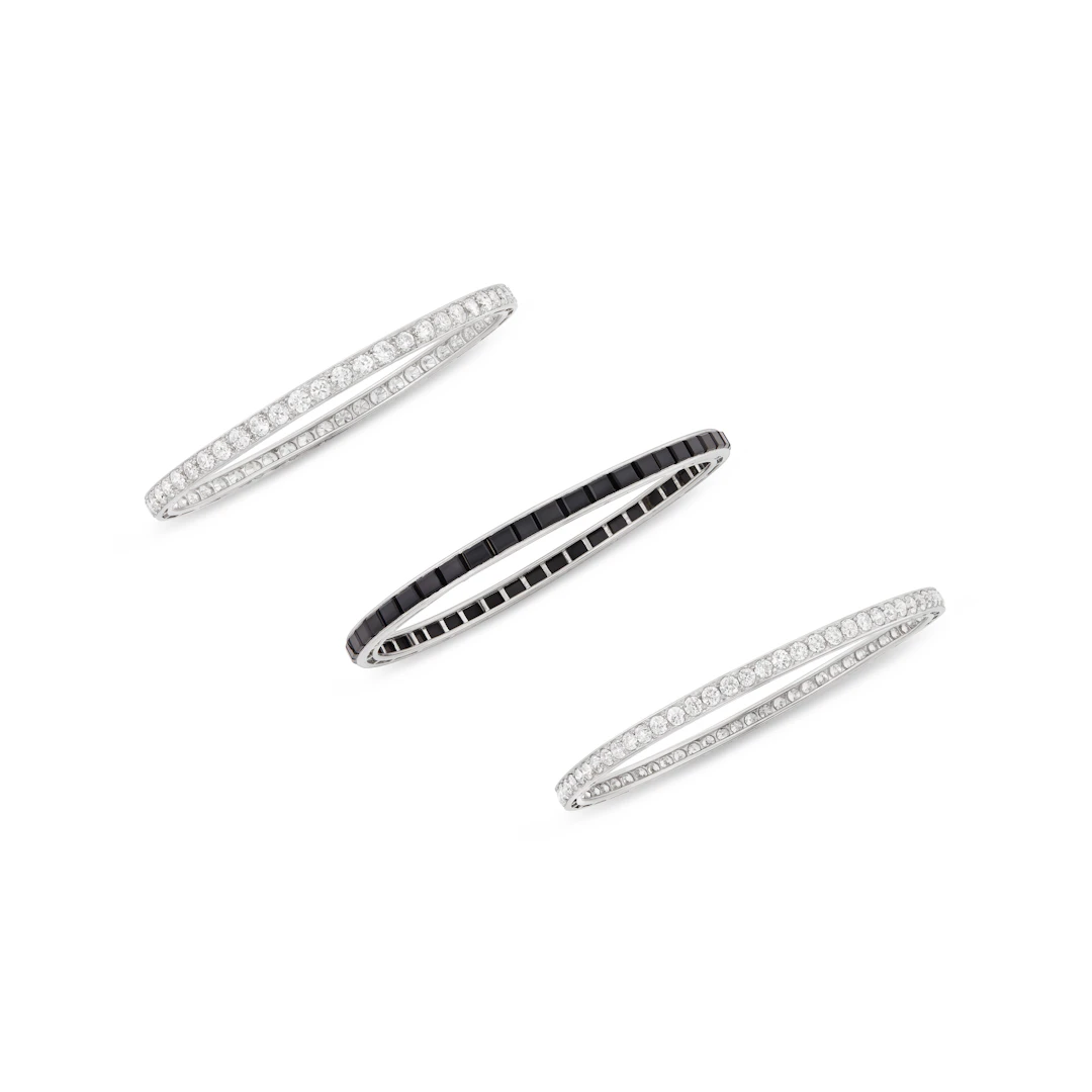 Tiffany & Co. Art Deco Group of Diamond and Onyx Bangle Bracelets