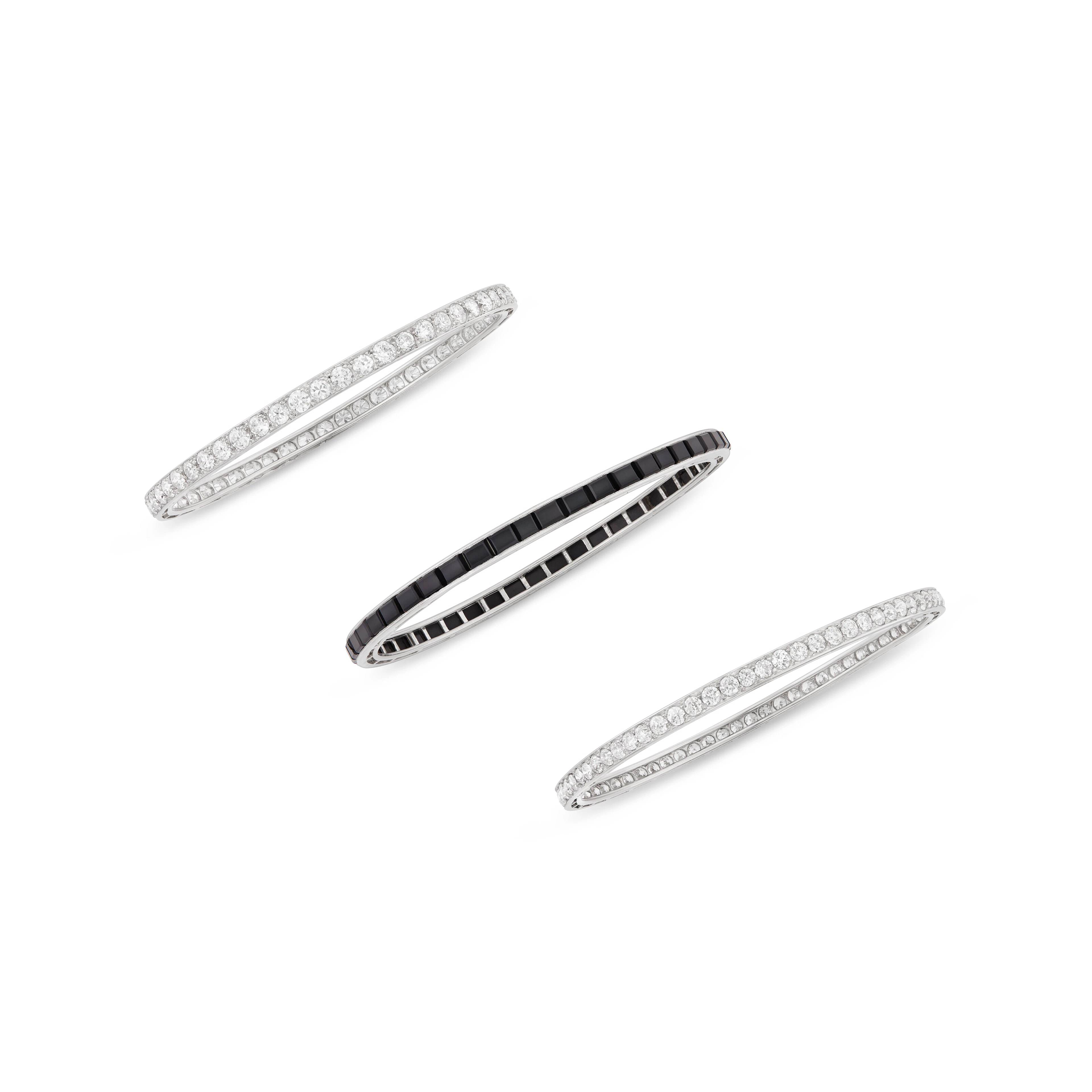 Tiffany & Co. Art Deco Group of Diamond and Onyx Bangle Bracelets