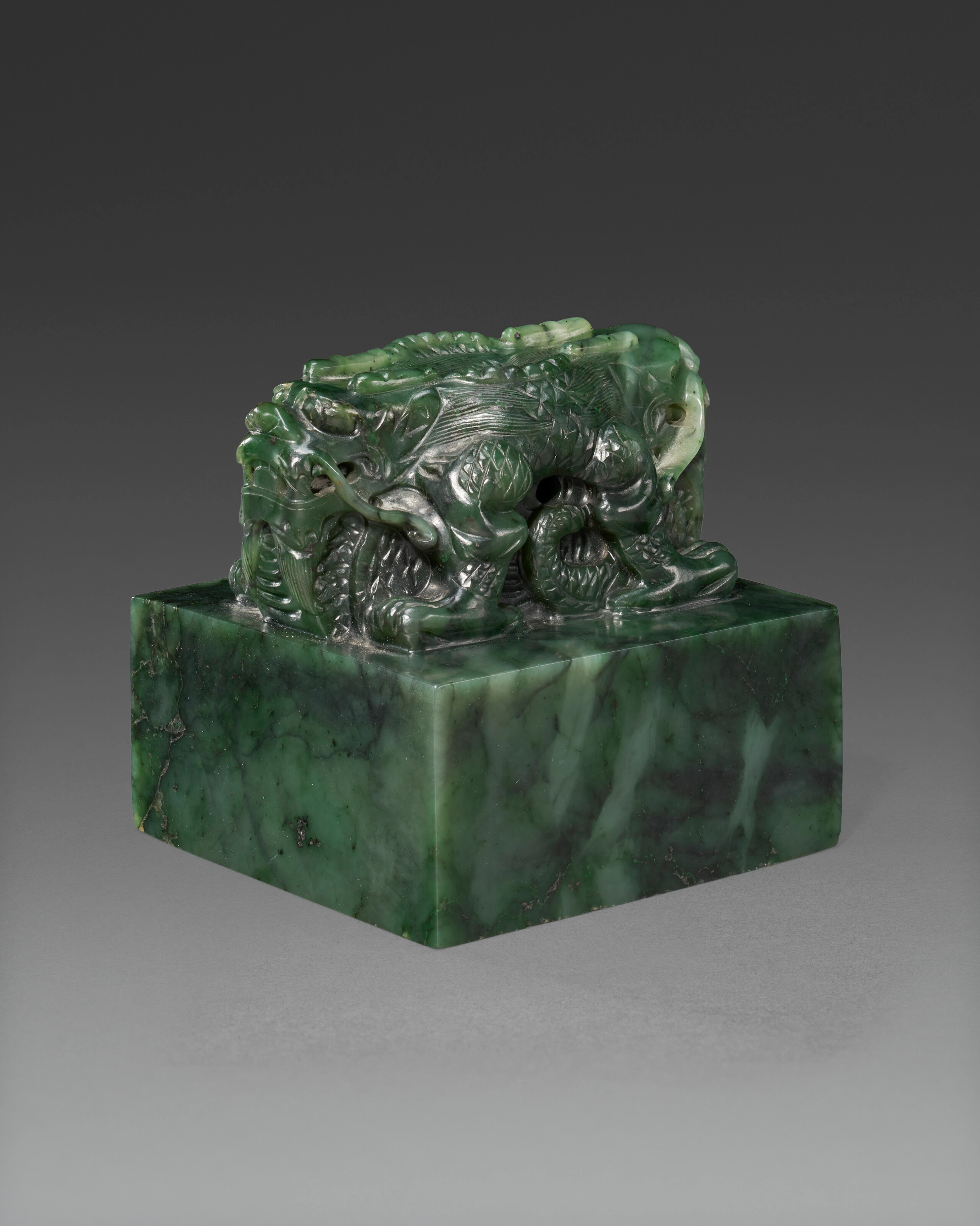 A Spinach-Green Jade 'Double Dragon' Square Seal Blank