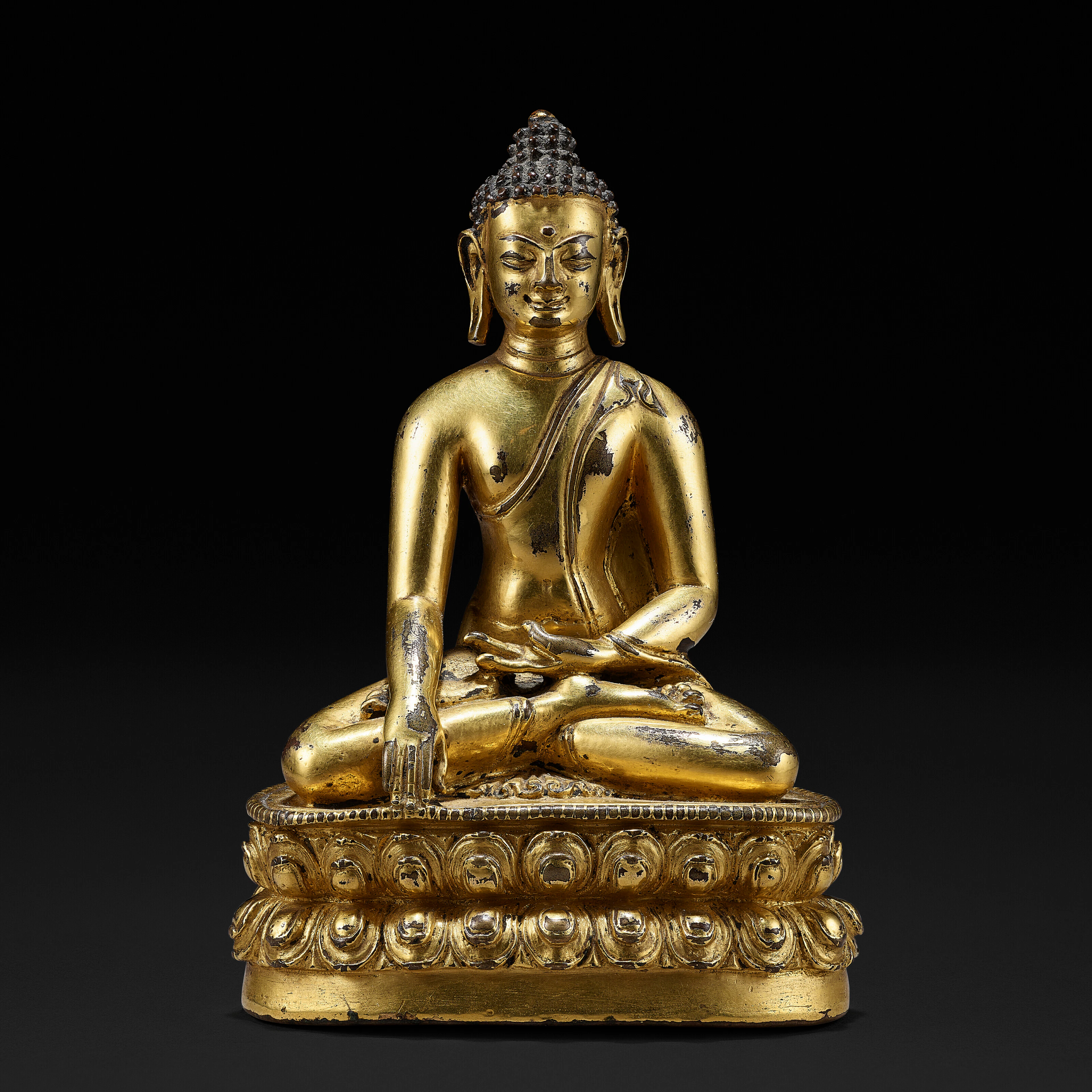 A Gilt Copper Alloy Figure of Shakyamuni Buddha