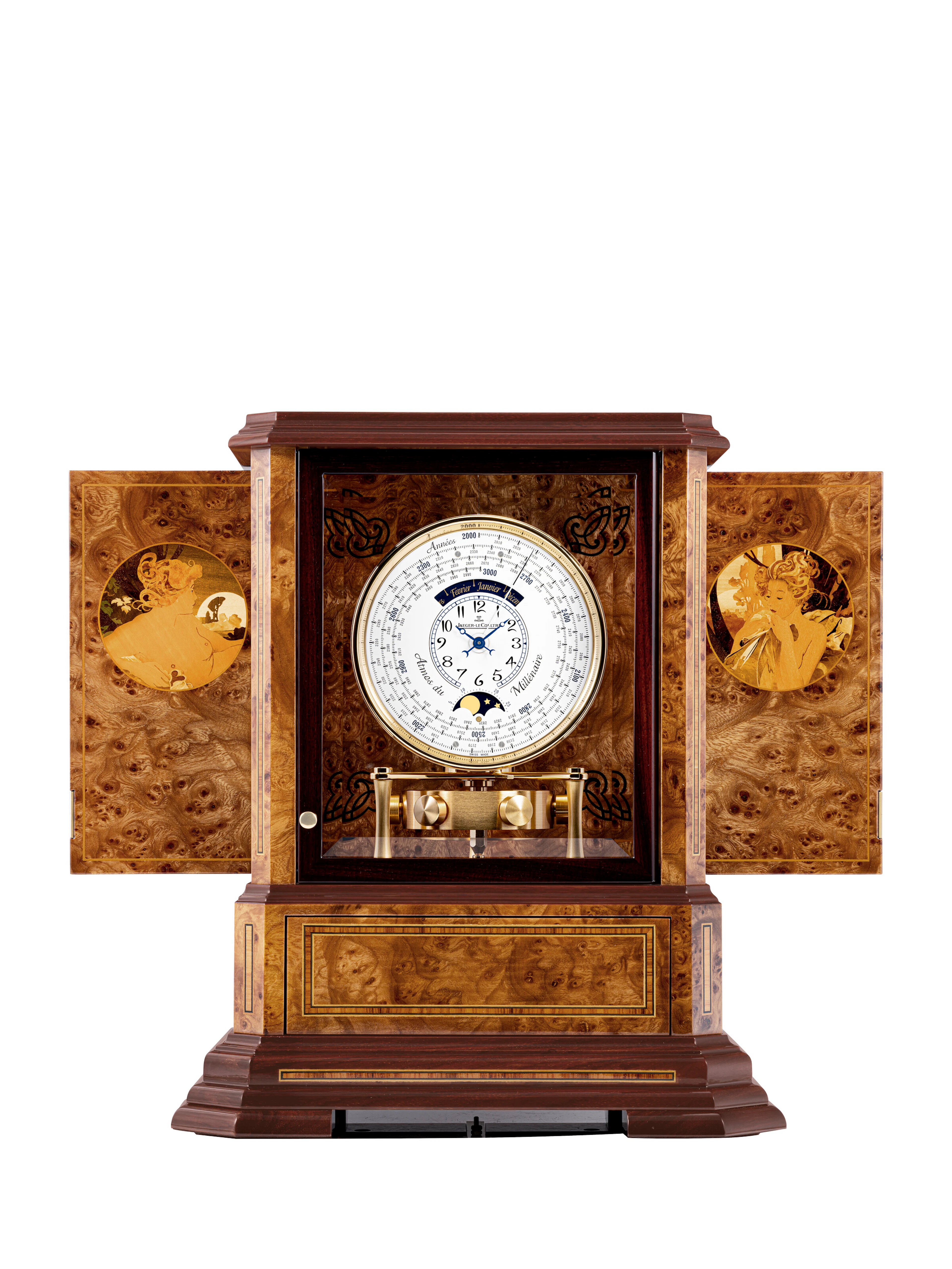 JAEGER-LECOULTRE. A VERY RARE WOOD AND GILT METAL ATMOS CLOCK WITH