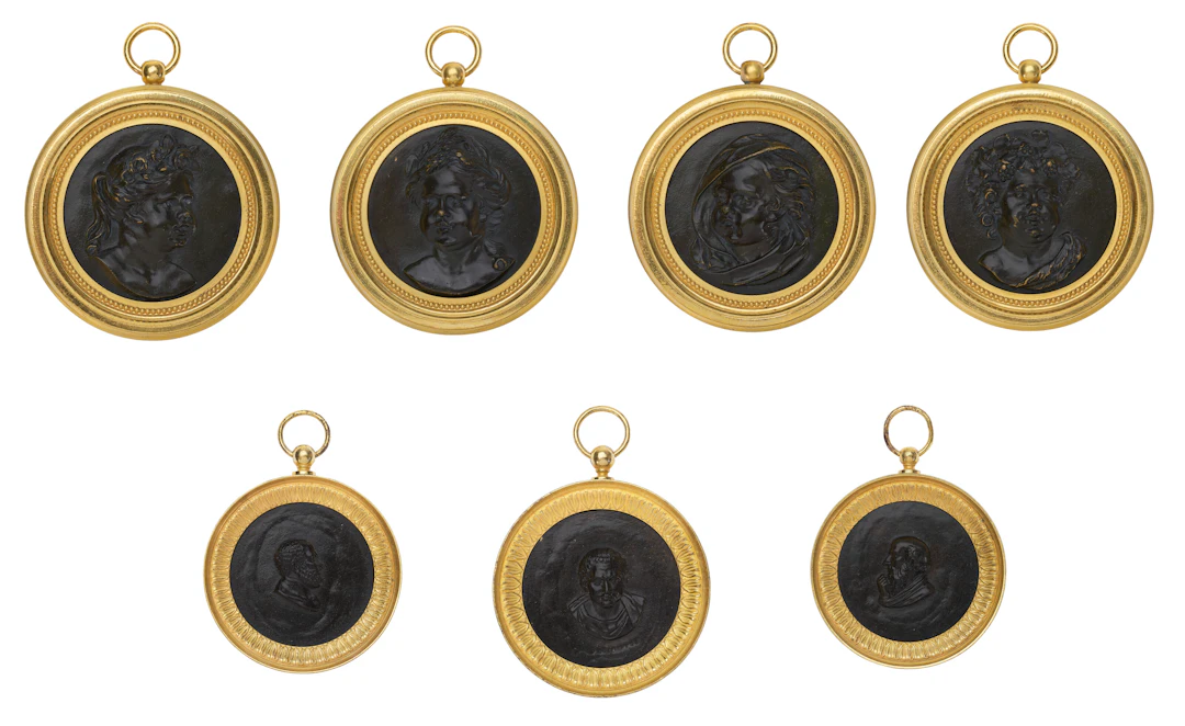 A Group of Seven French Ormolu and Patinated Bronze Portrait Medallions