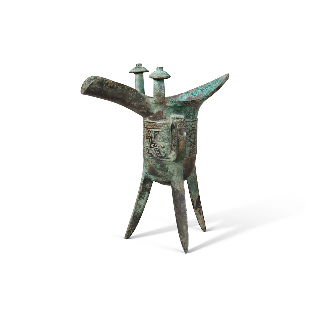 An Archaic Bronze Ritual Tripod Wine Vessel, Jue