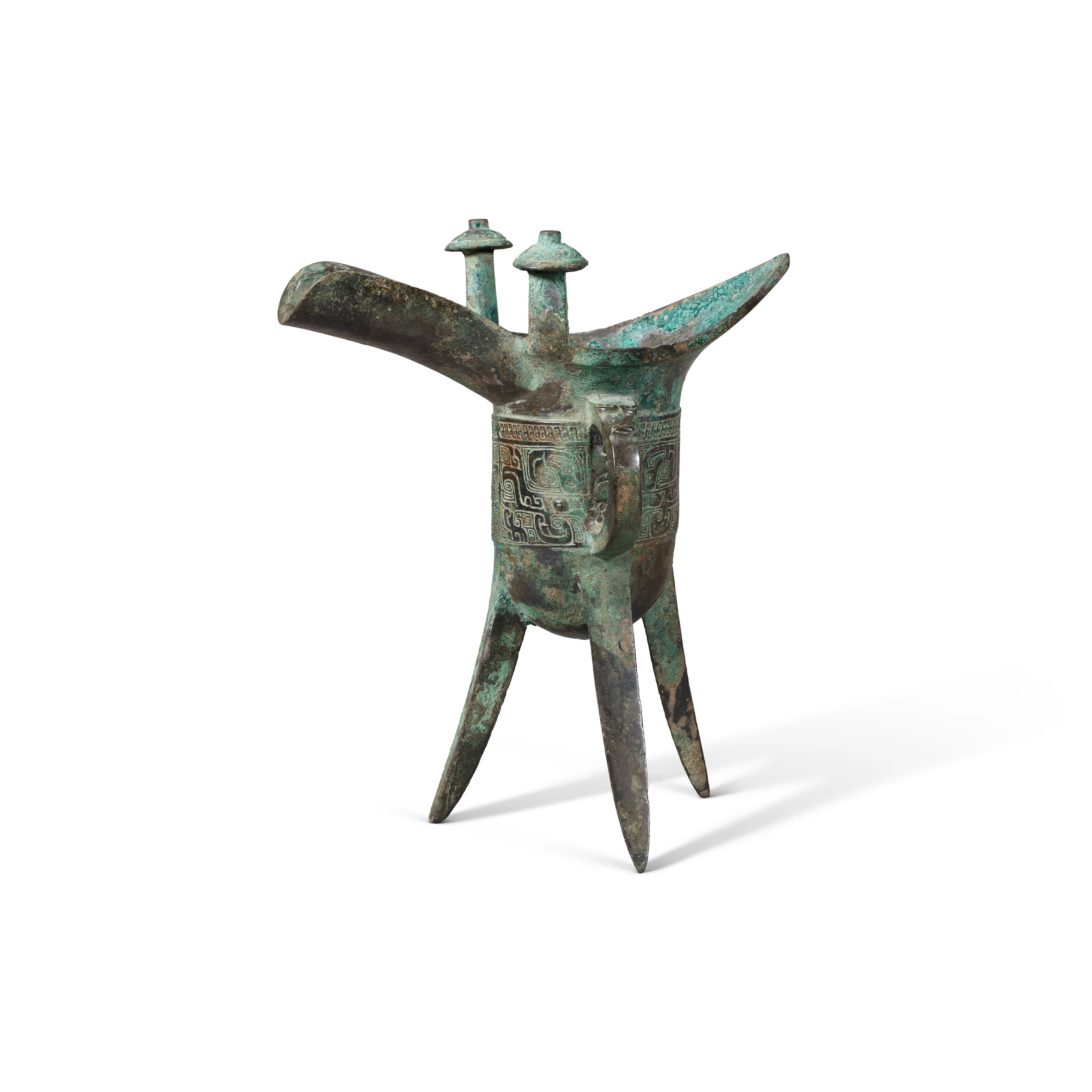 An Archaic Bronze Ritual Tripod Wine Vessel, Jue