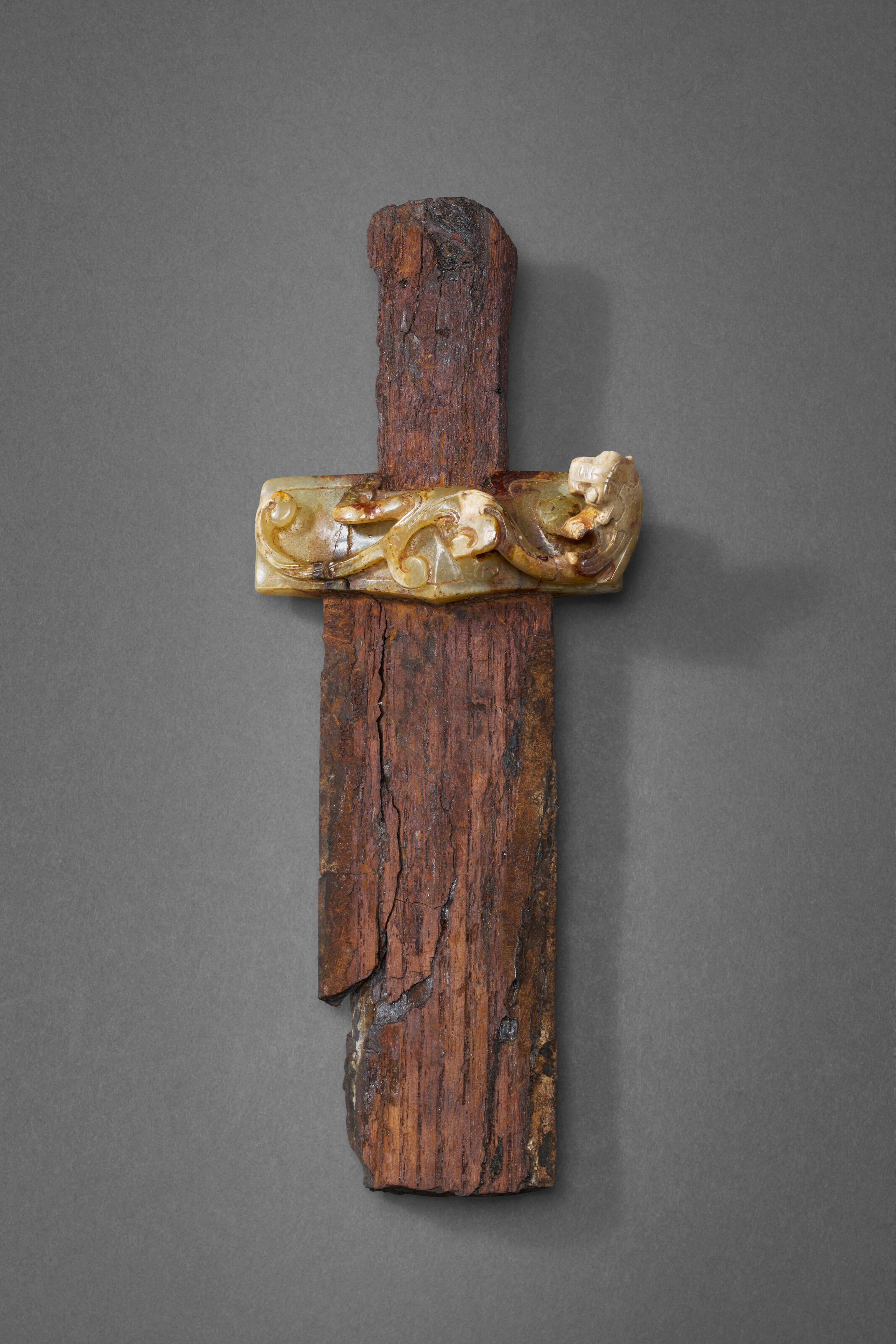 A Jade Sword Guard Attached to Remnants of an Iron Sword
