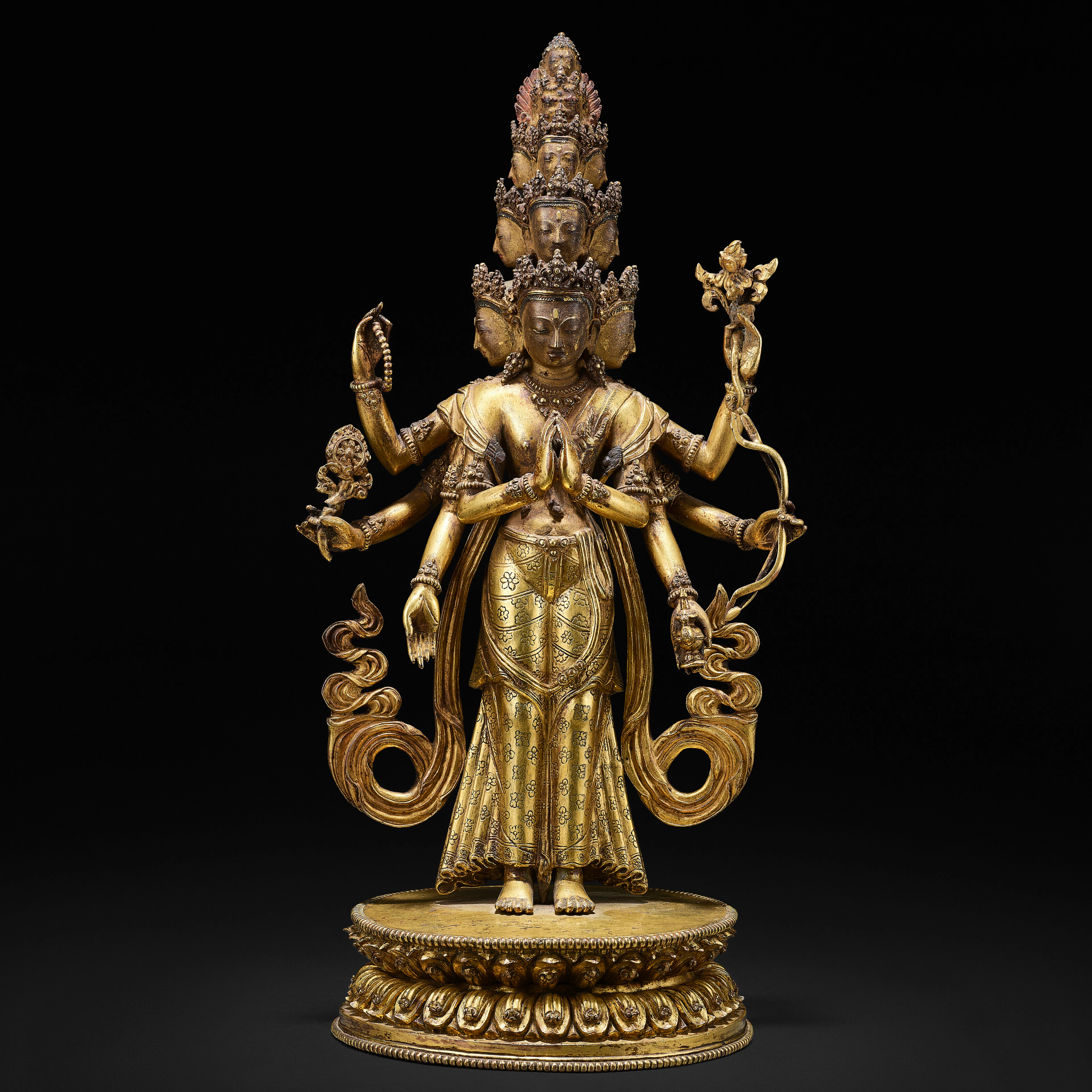 A Gilt Copper Alloy Figure of Eleven-Headed Avalokiteshvara