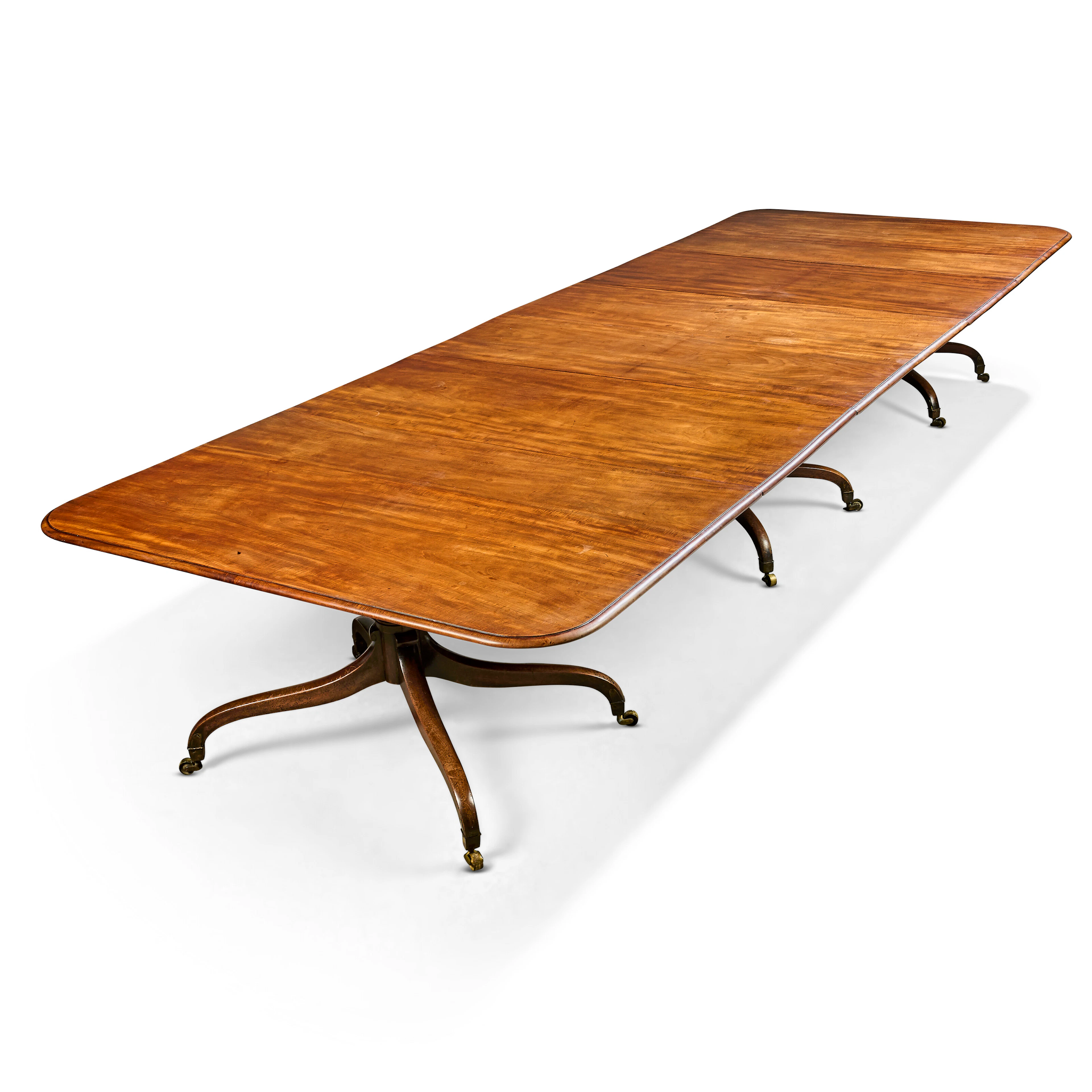 An English Mahogany Three-Pedestal Dining Table