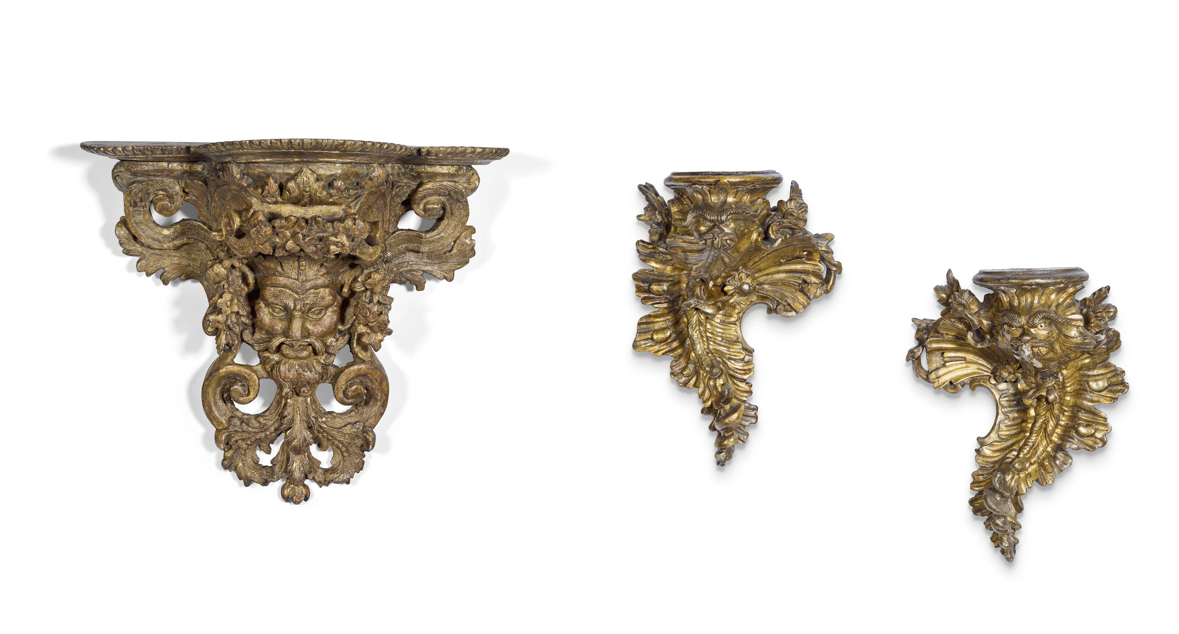 A Pair of Italian Gilt-Lacquered Silvered (Lacca a Mecca) Wall Brackets