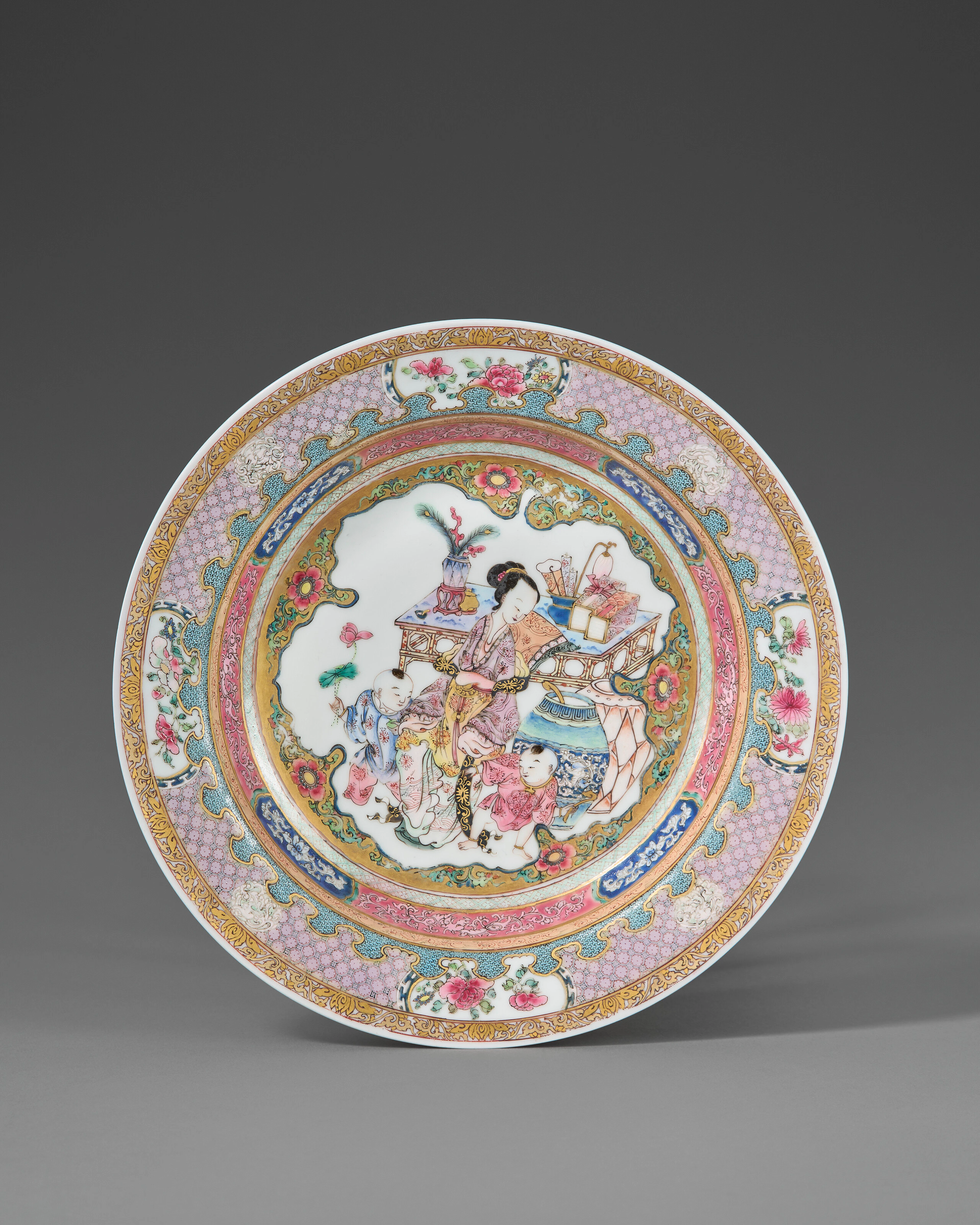 A Famille Rose 'Eggshell' Ruby-Back 'Lady and Children' Dish