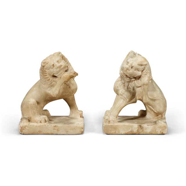 An Extremely Rare Pair of White Marble Lions