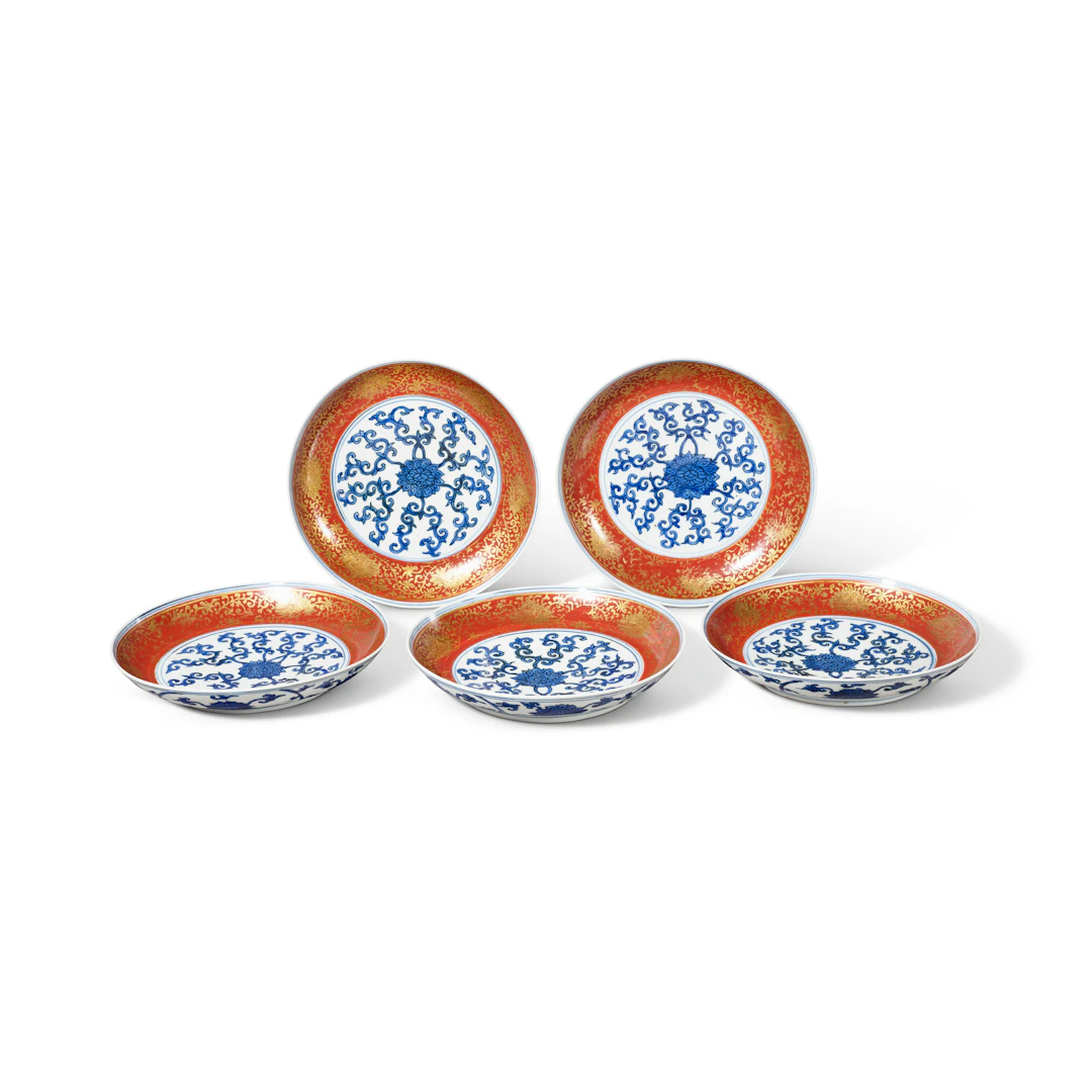 A Rare Set of Five Iron-Red and Gilt-Decorated Blue and White 'Lotus' Dishes