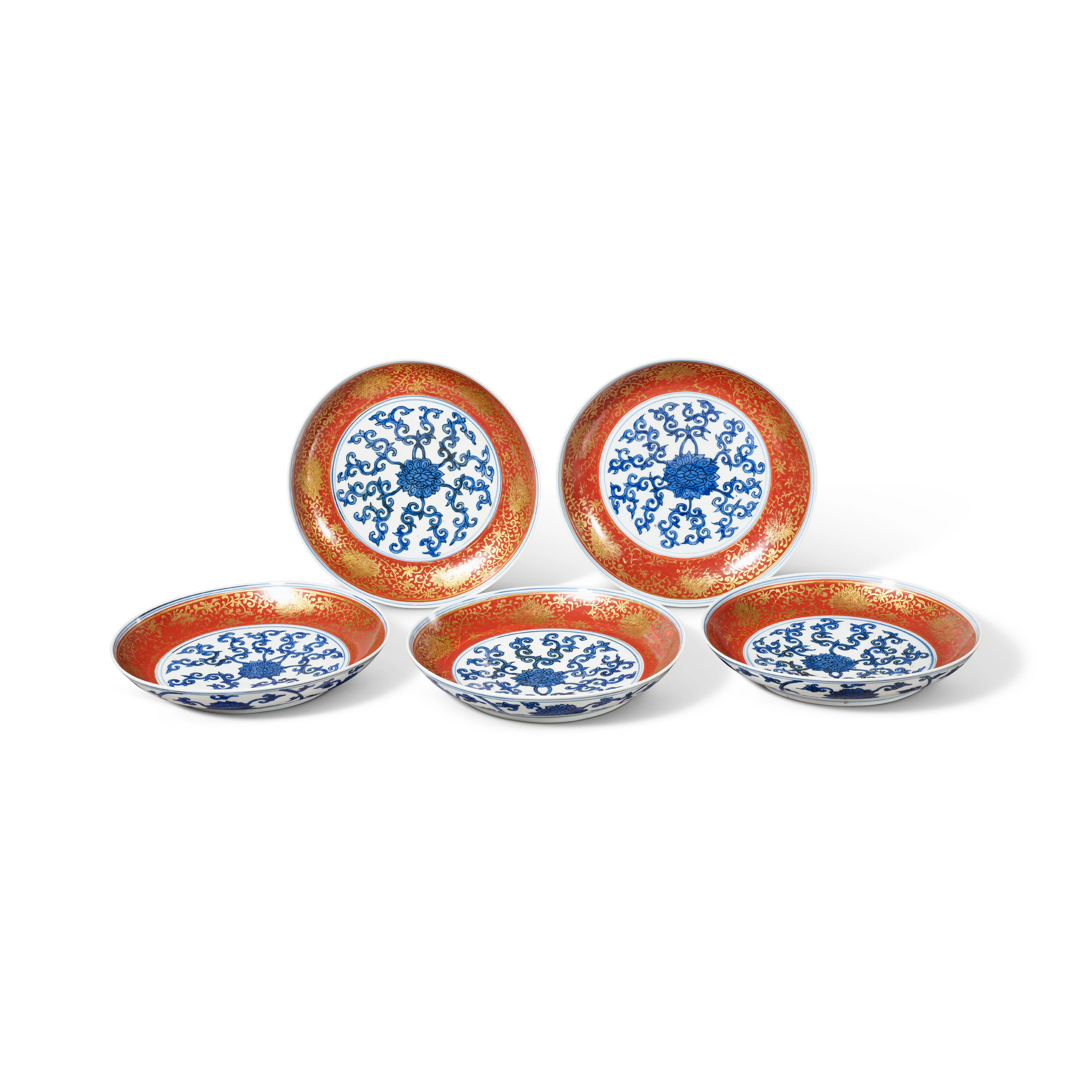 A Rare Set of Five Iron-Red and Gilt-Decorated Blue and White 'Lotus' Dishes