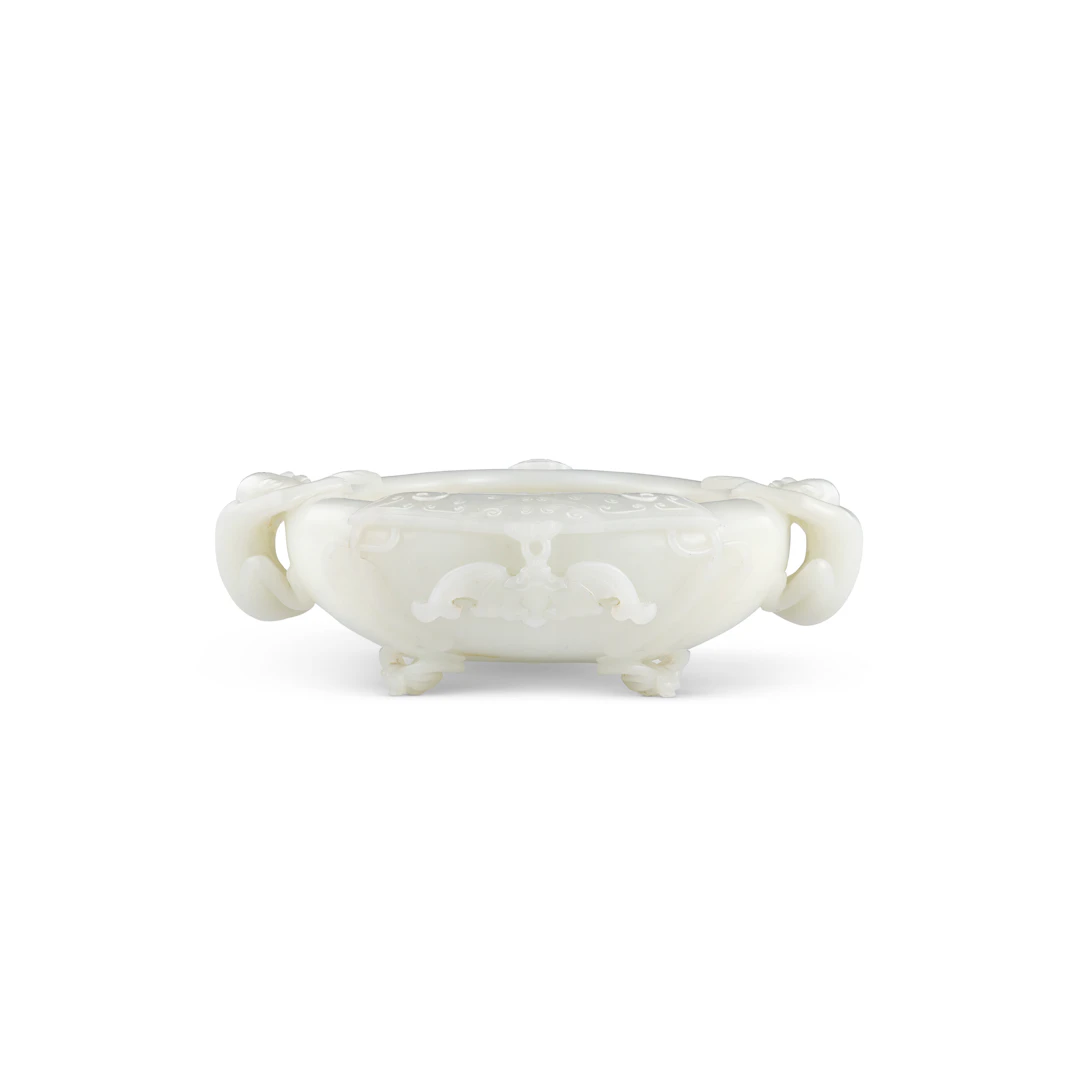 An Exceptionally Rare White Jade 'Monkey and Bat' Peach-Form Washer