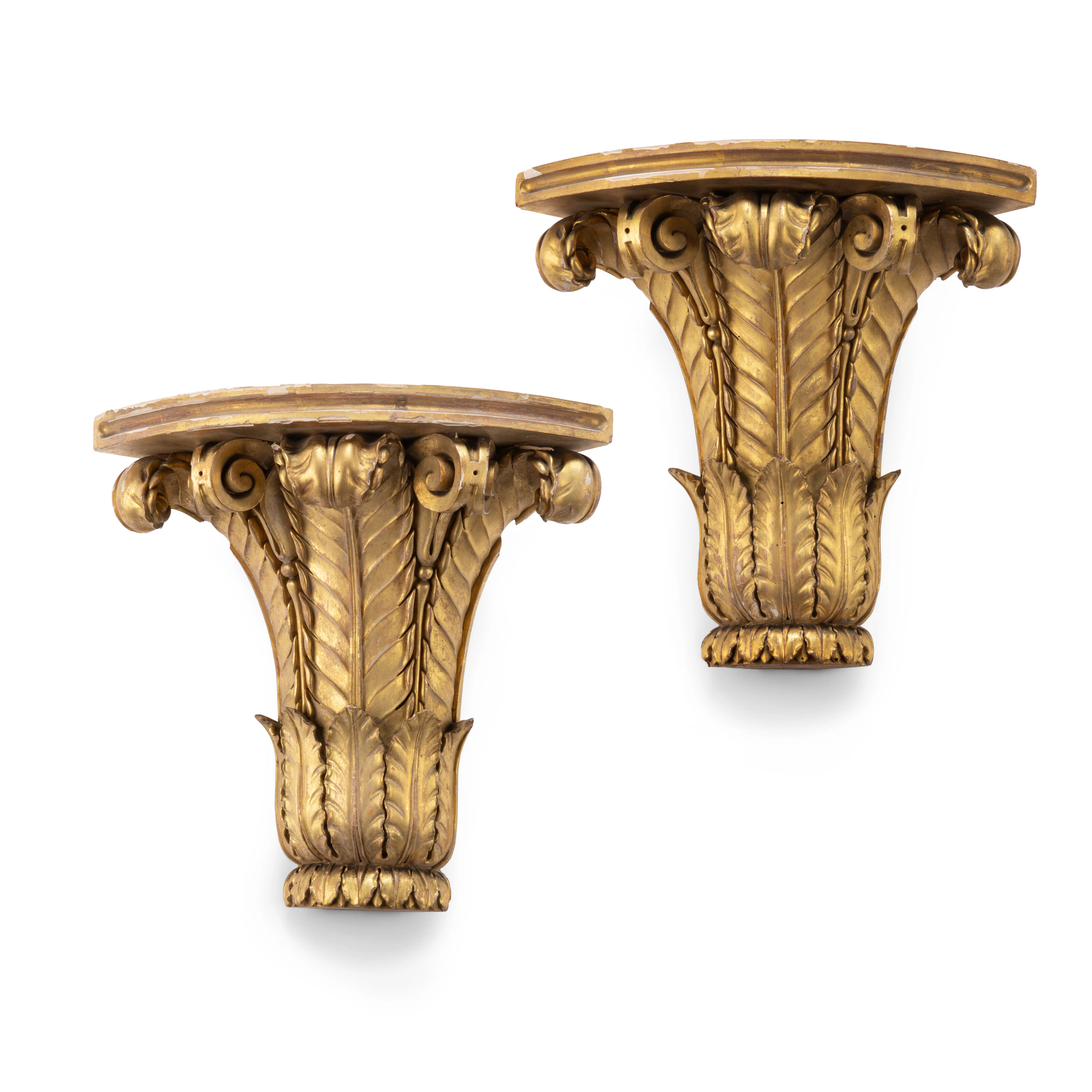 A Pair of Regency Giltwood Corner Brackets