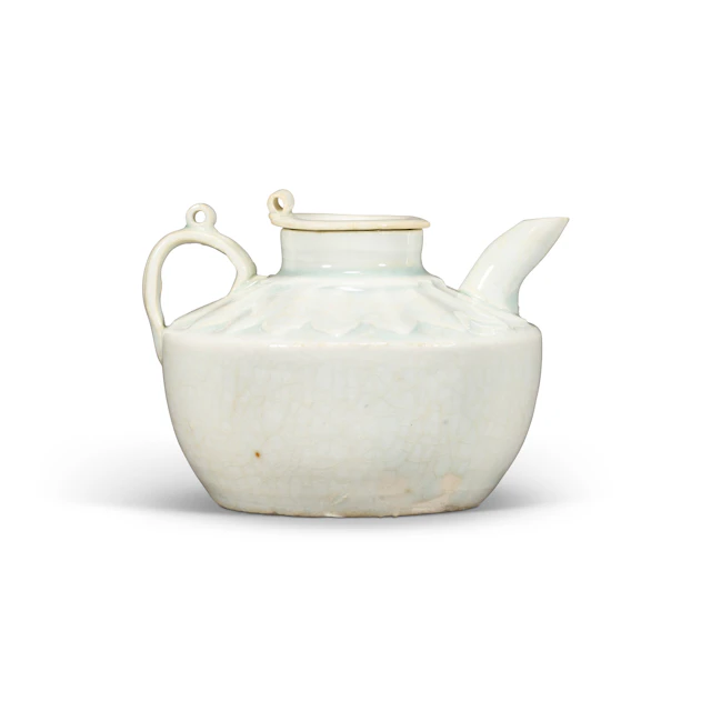 A Small Carved Qingbai 'Lotus' Ewer and Cover