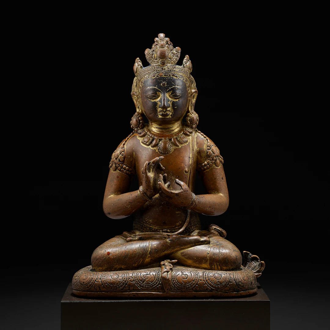 A Gilt Copper Figure of Manjushri
