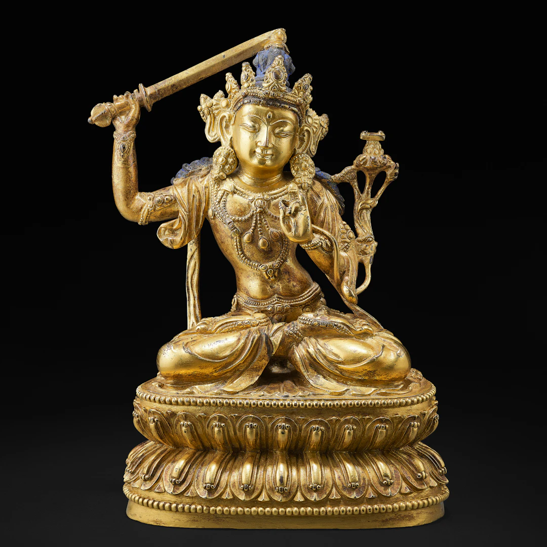 A Gilt Copper Alloy Figure of Manjushri