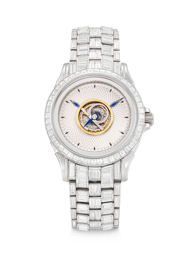 Omega. An Only Known, Dazzling and Important 18K White Gold and Baguette-Cut
