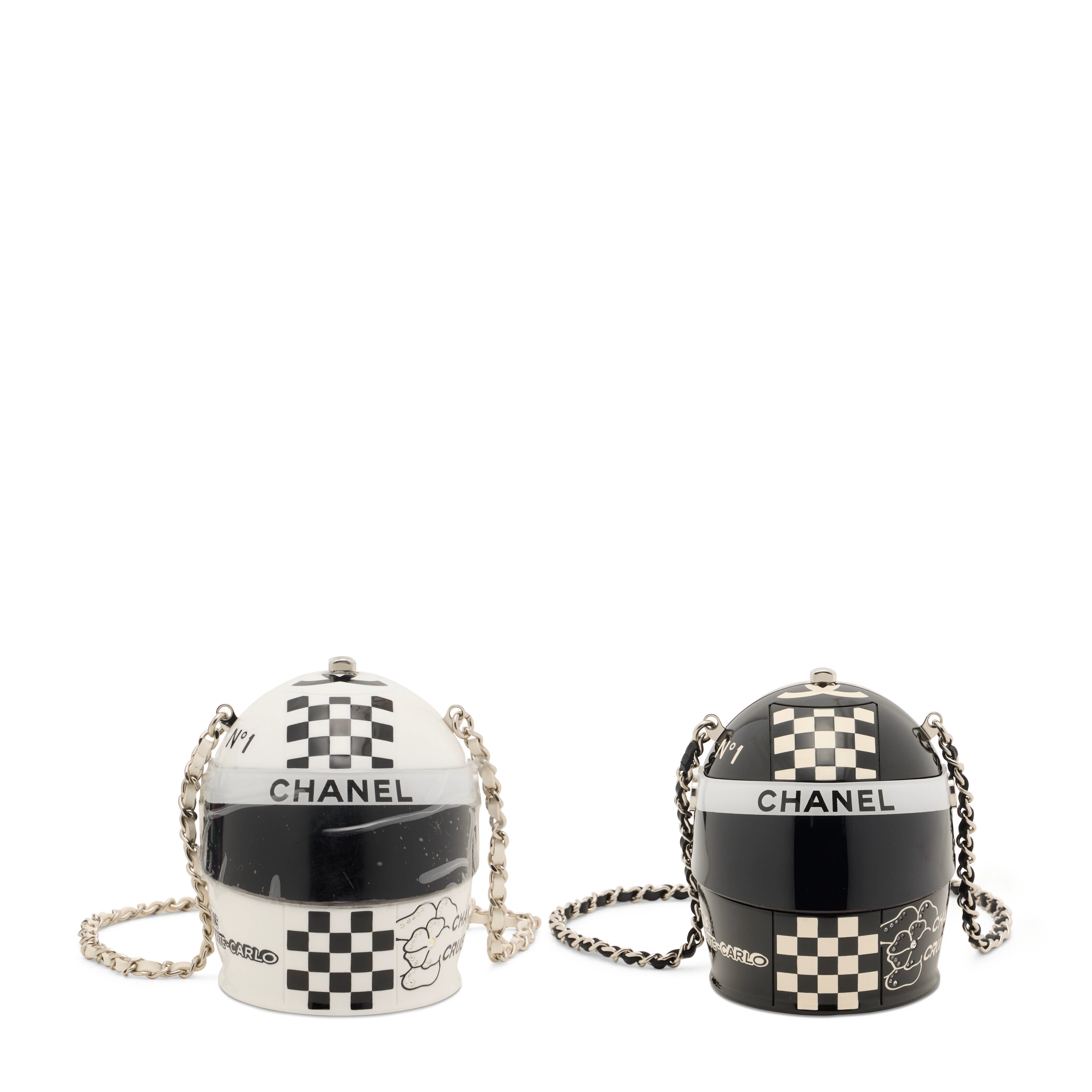 A SET OF TWO: MONTE CARLO CRUISE RUNWAY BLACK & WHITE HELMET MINAUDIÈRE BAGS