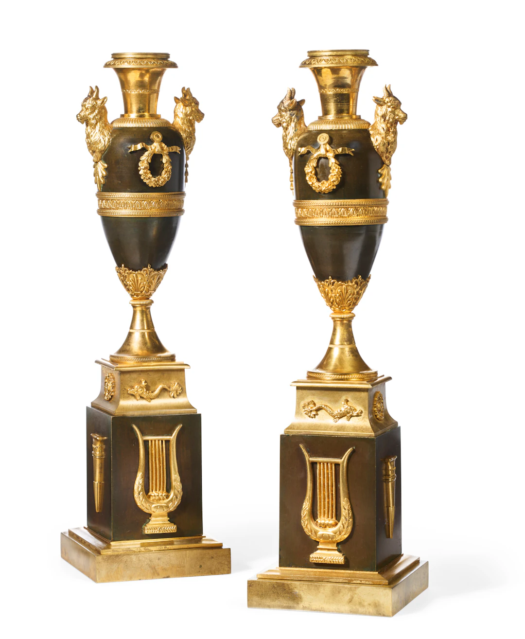A Pair of North European Ormolu and Patinated Bronze Candlesticks